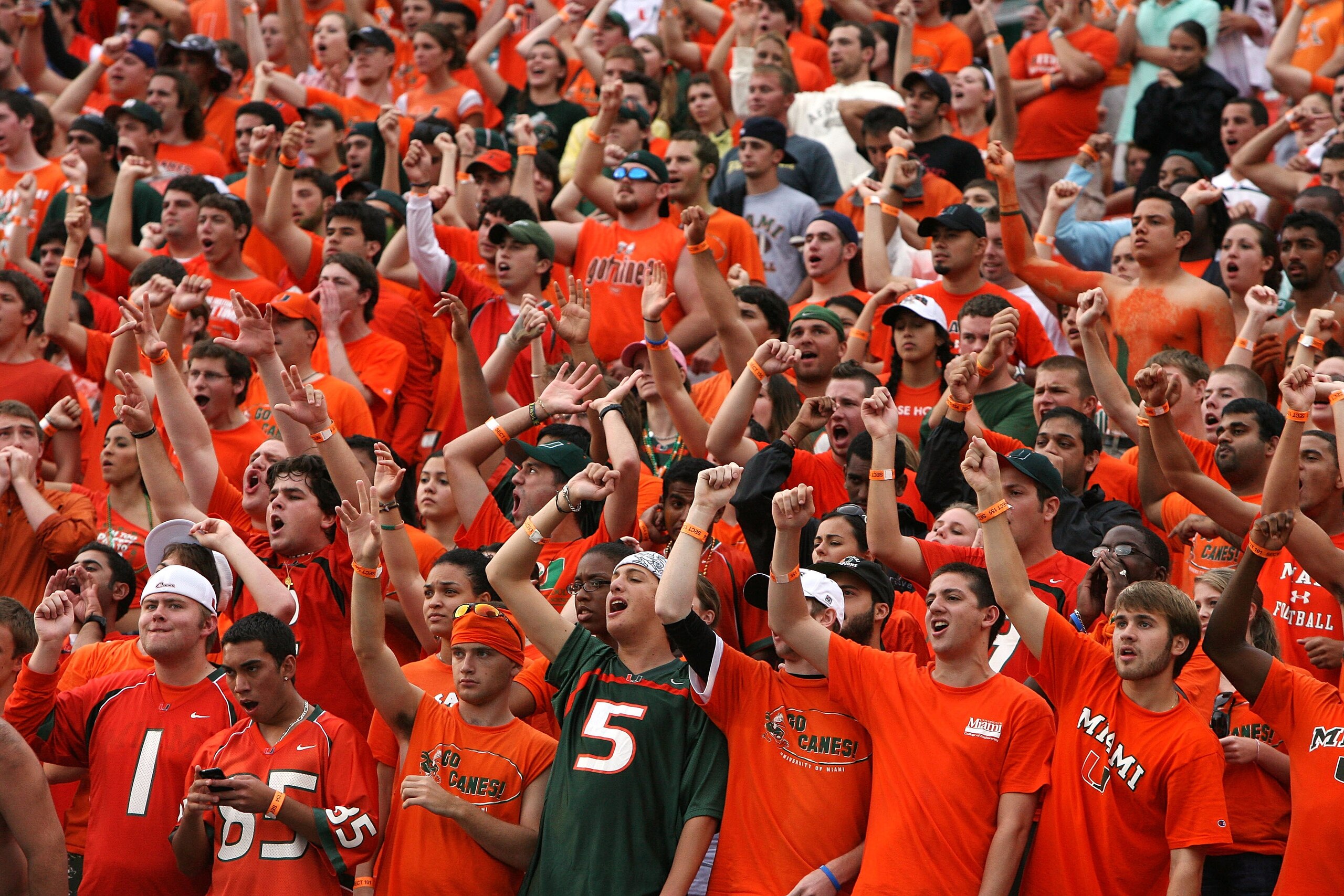 MIAMI - OCTOBER 04:  Hurricane fans support their team as the Florida State Seminoles take on the Miami Hurricanes at Dolphin Stadium on October 4, 2008 in Miami, Florida. Florida State defeated Miami 41-39.  (Photo by Doug Benc/Getty Images)