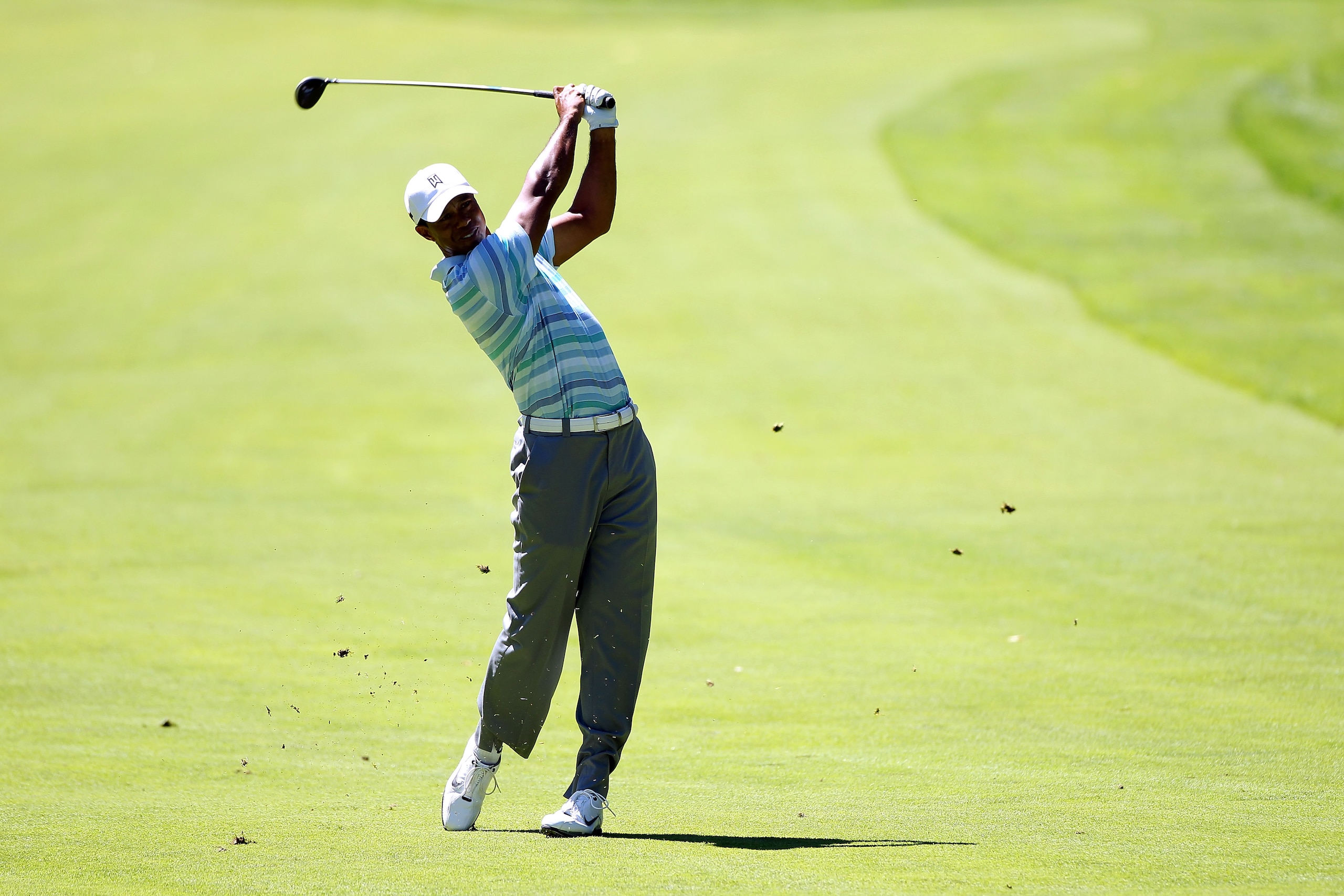 PARAMUS, NJ - AUGUST 27:  Tiger Woods watches his second shot on the 17th hole during the second round of The Barclays at the Ridgewood Country Club on August 27, 2010 in Paramus, New Jersey.  (Photo by Hunter Martin/Getty Images)