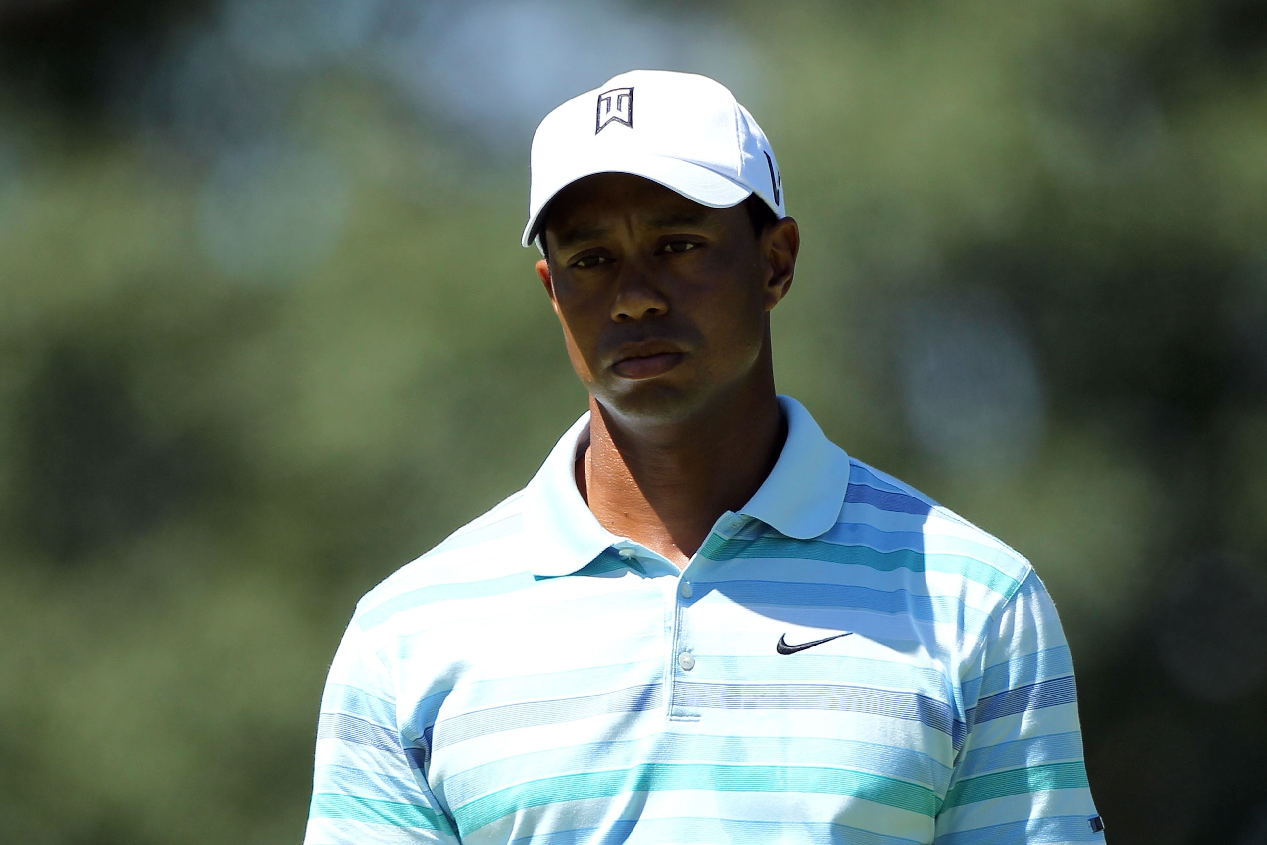 PARAMUS, NJ - AUGUST 27:  Tiger Woods looks on from the 12th green during the second round of The Barclays at the Ridgewood Country Club on August 27, 2010 in Paramus, New Jersey.  (Photo by Hunter Martin/Getty Images)