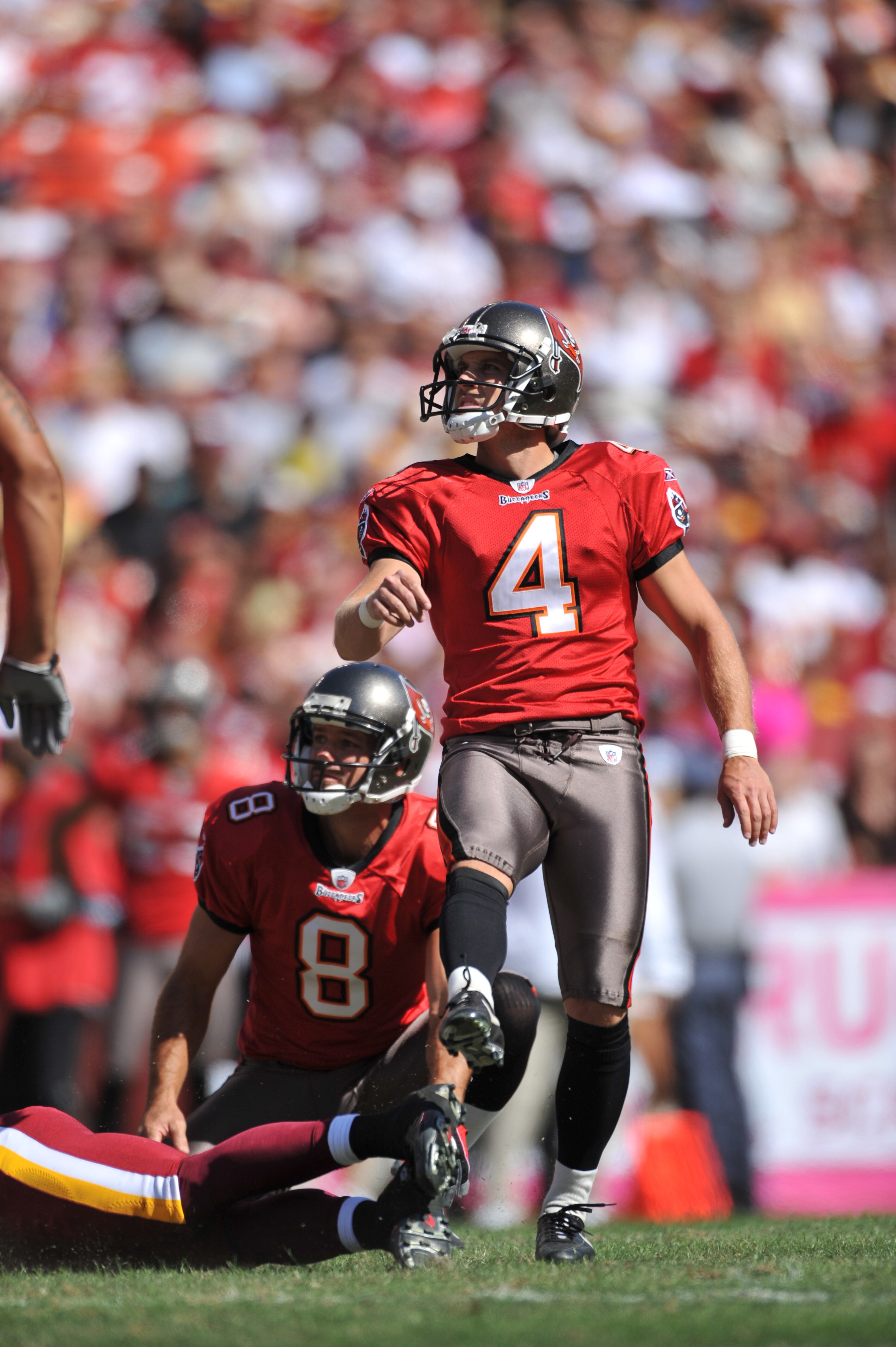 LANDOVER, MD - OCTOBER 4:  Mike Nugent #4 of the Tampa Bay Buccaneers watches his missed field goal against the Washington Redskins at FedExField on October 4, 2009 in Landover, Maryland. The Redskins defeated the Buccaneers 16-13. (Photo by Larry French/