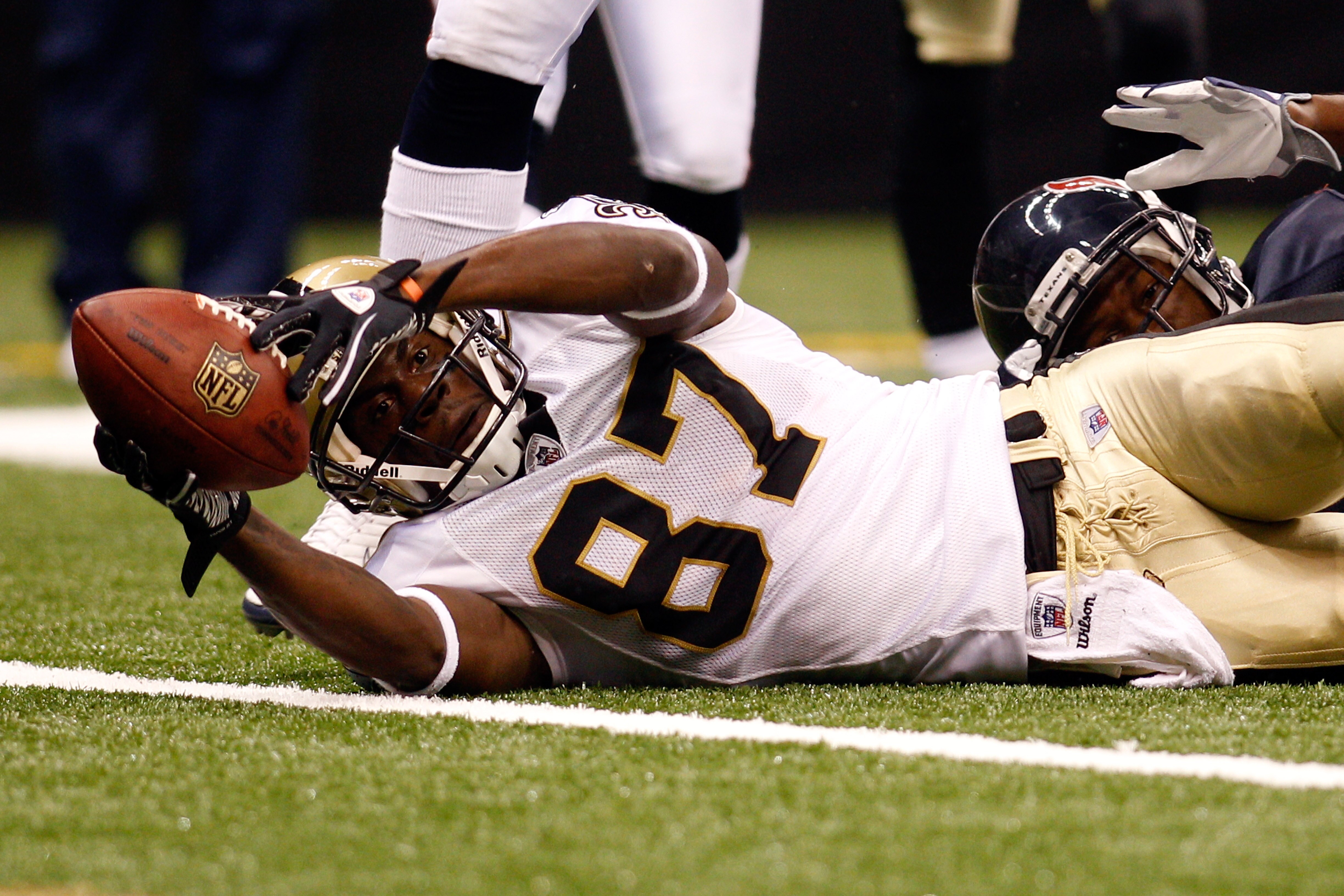 NEW ORLEANS - AUGUST 21:  Adrian Arrington #87 of the New Orleans Saints in action during the game against the Houston Texans at the Louisiana Superdome on August 21, 2010 in New Orleans, Louisiana.  (Photo by Chris Graythen/Getty Images)