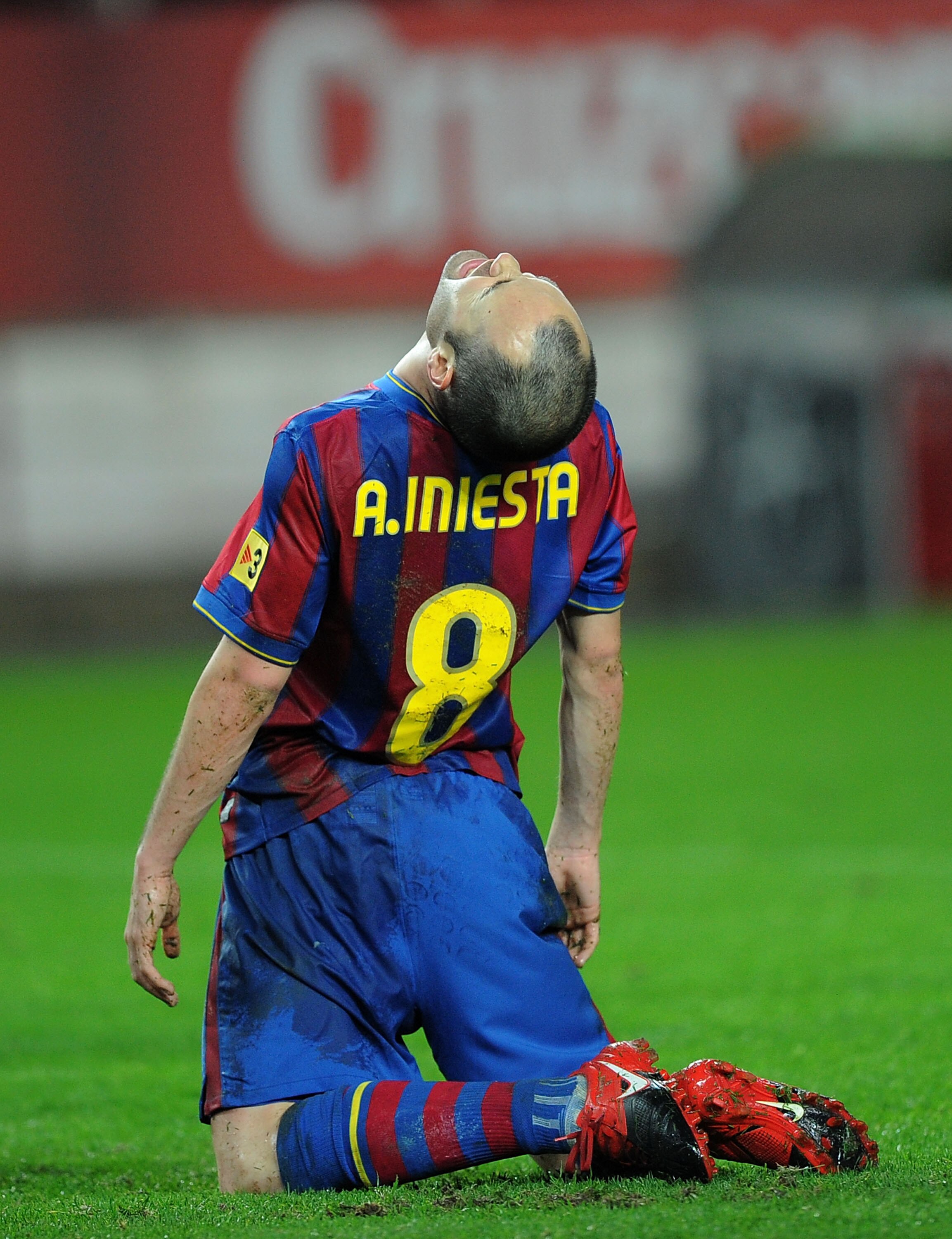 SEVILLE, SPAIN - JANUARY 13:  Andres Iniesta of Barcelona reacts during the last 16 second leg Copa del Rey match between Barcelona and Sevilla at the Ramon Sanchez Pizjuan stadium on January 13, 2010 in Seville, Spain.  (Photo by Denis Doyle/Getty Images