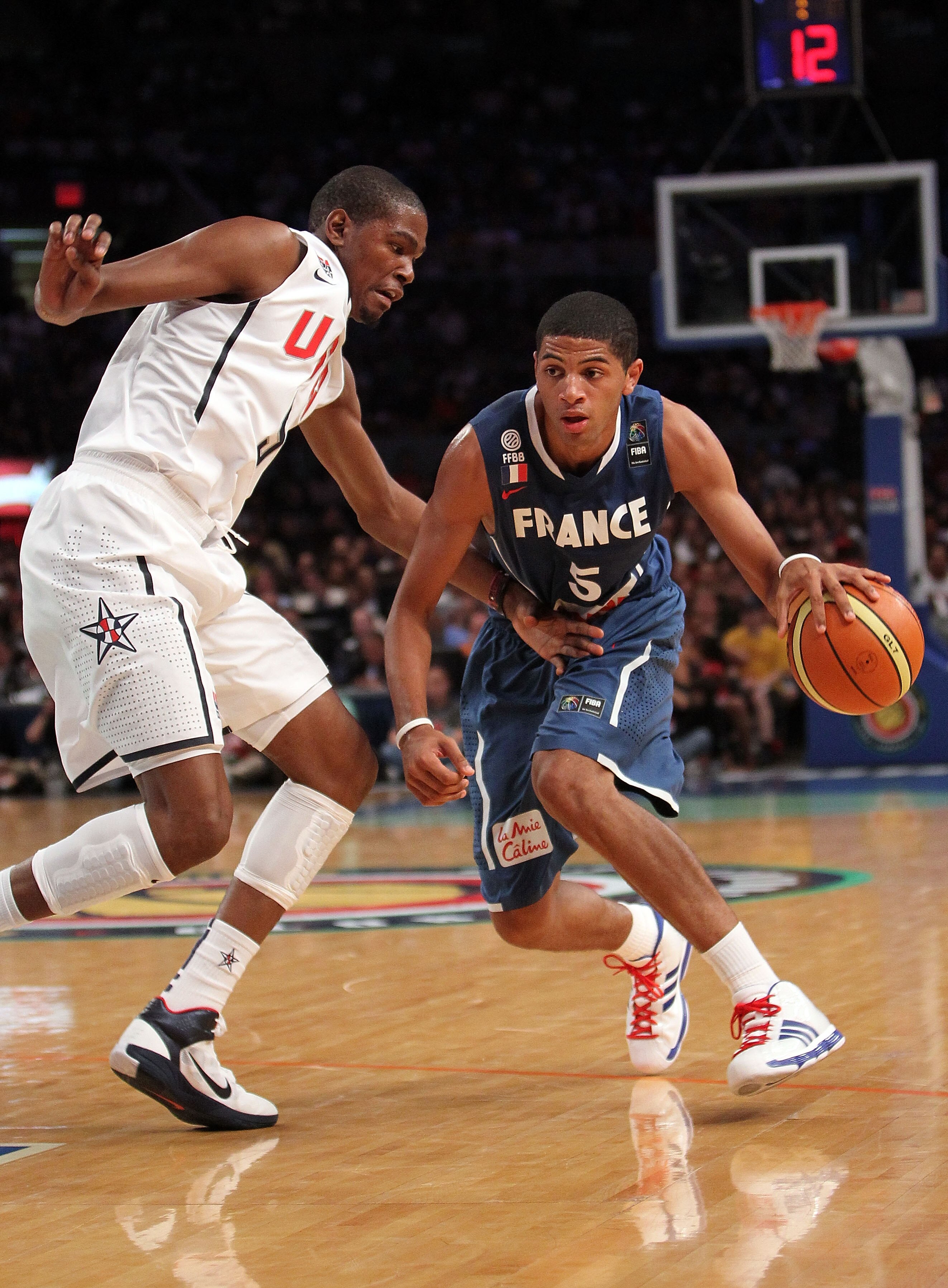 NEW YORK - AUGUST 15:  Nicholas Batum #5 of France drives to the basket past Kevin Durant #5 of the United States during their exhibition game as part of the World Basketball Festival at Madison Square Garden on August 15, 2010 in New York City.  (Photo b