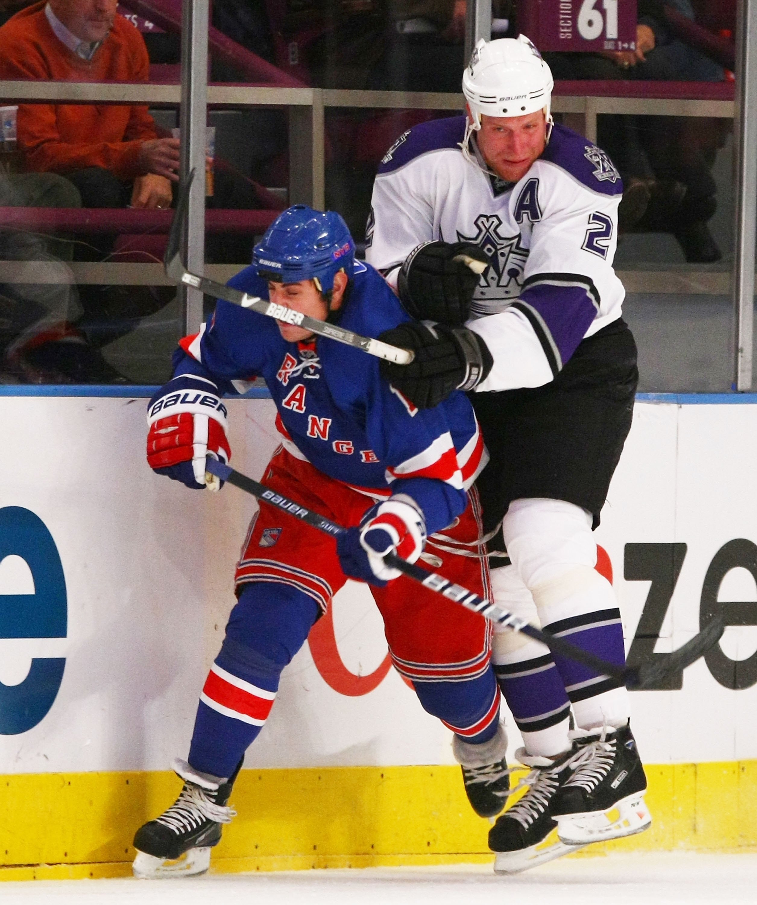 NEW YORK - OCTOBER 14: Matt Greene #2 of the Los Angeles Kings hits Brandon Dubinsky #17 of the New York Rangers at Madison Square Garden on October 14, 2009 in New York, New York. (Photo by Bruce Bennett/Getty Images)