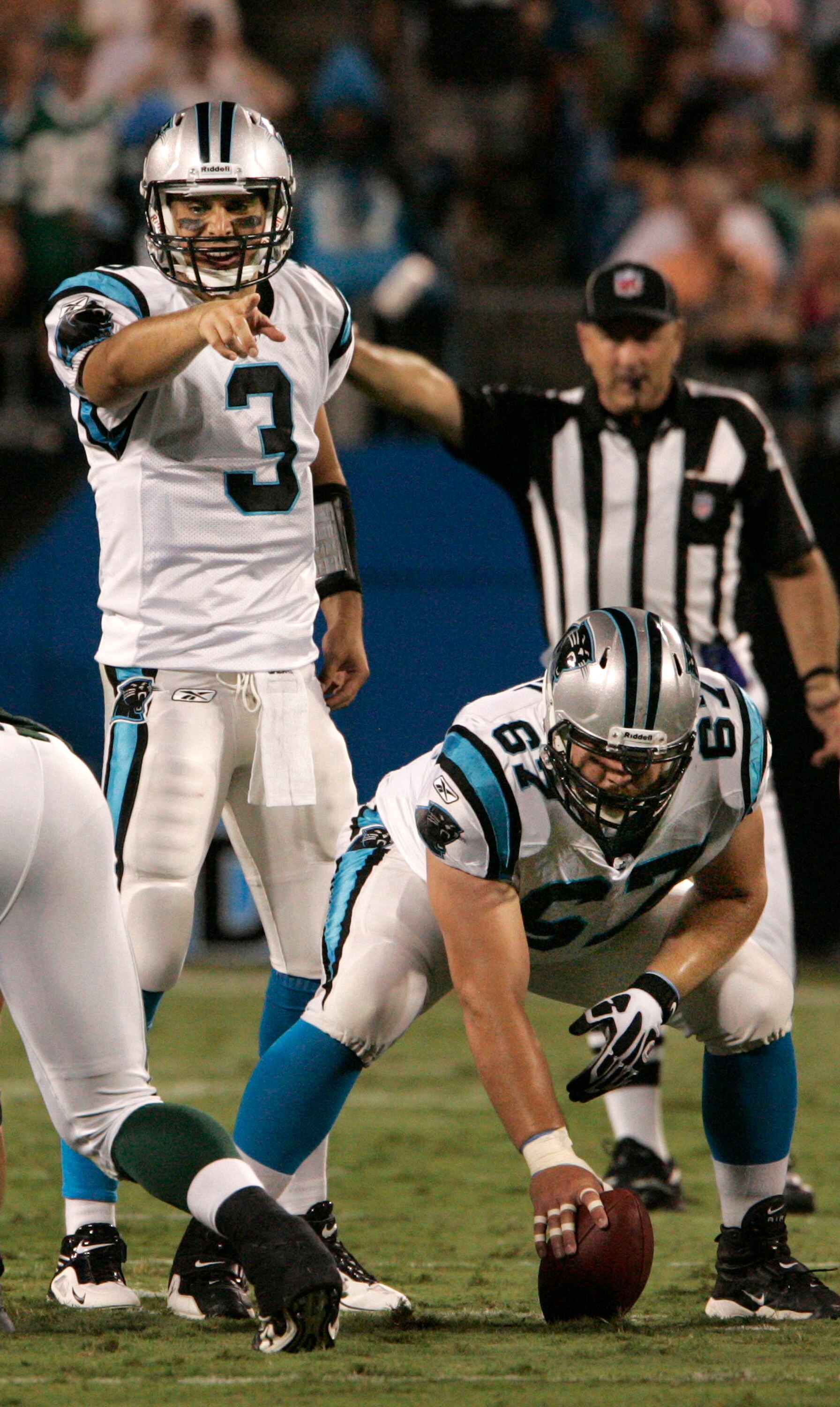 CHARLOTTE, NC - AUGUST 21:  Quarterback Matt Moore #3 of the Carolina Panthers signals to his team during their preseason game against the New York Jets at Bank of America Stadium on August 21, 2010 in Charlotte, North Carolina. (Photo by Mary Ann Chastai