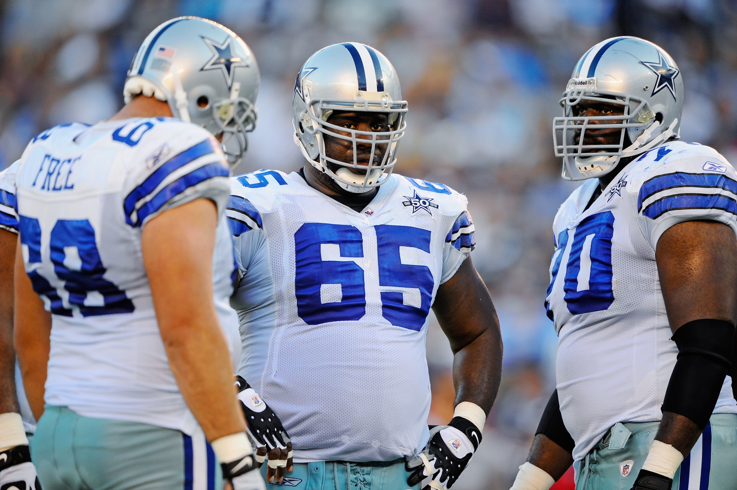 SAN DIEGO - AUGUST 21: Doug Free #68, Andre Gurode #65 and Leonard Davis #70 of the Dallas Cowboys in action during the pre-season NFL football game against San Diego Chargers at Qualcomm Stadium on August 21, 2010 in San Diego, California. (Photo by Ke SAN DIEGO - AUGUST 21: Doug Free #68, Andre Gurode #65 and Leonard Davis #70 of the Dallas Cowboys in action during the pre-season NFL football game against San Diego Chargers at Qualcomm Stadium on August 21, 2010 in San Diego, California. (Photo by Ke