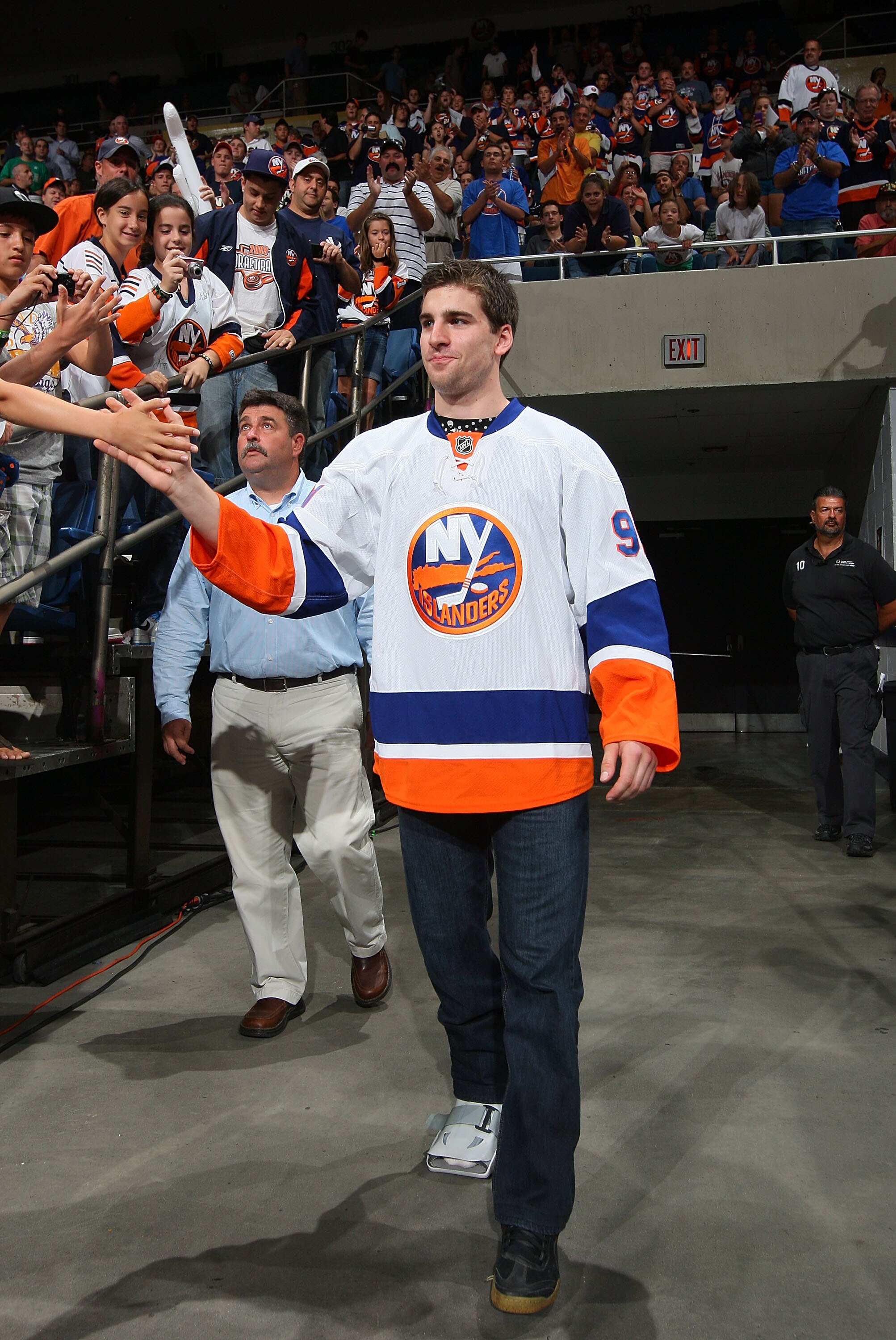 UNIONDALE, NY - JUNE 25:  John Tavares # 91 of the New York Islanders is introduced wearing the new 2010-2011 road jersey during the New York Islanders Draft Day Party on June 25, 2010 at Nassau Coliseum in Uniondale, New York.  (Photo by Mike Stobe/Getty
