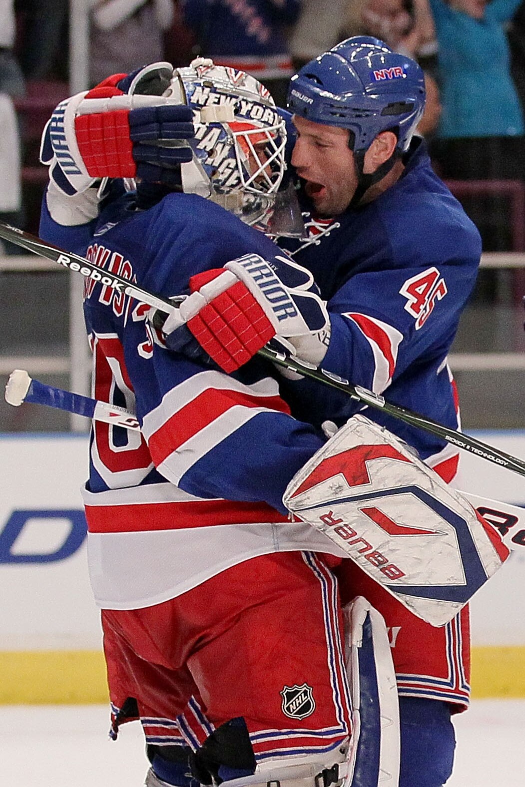 NEW YORK - APRIL 09: Henrik Lundqvist #30 of the New York Rangers celebrates victory with team mate Jody Shelley #45 against the Philadelphia Flyers during their game on April 9, 2010 at Madison Square Garden in New York City.  (Photo by Chris McGrath/Get