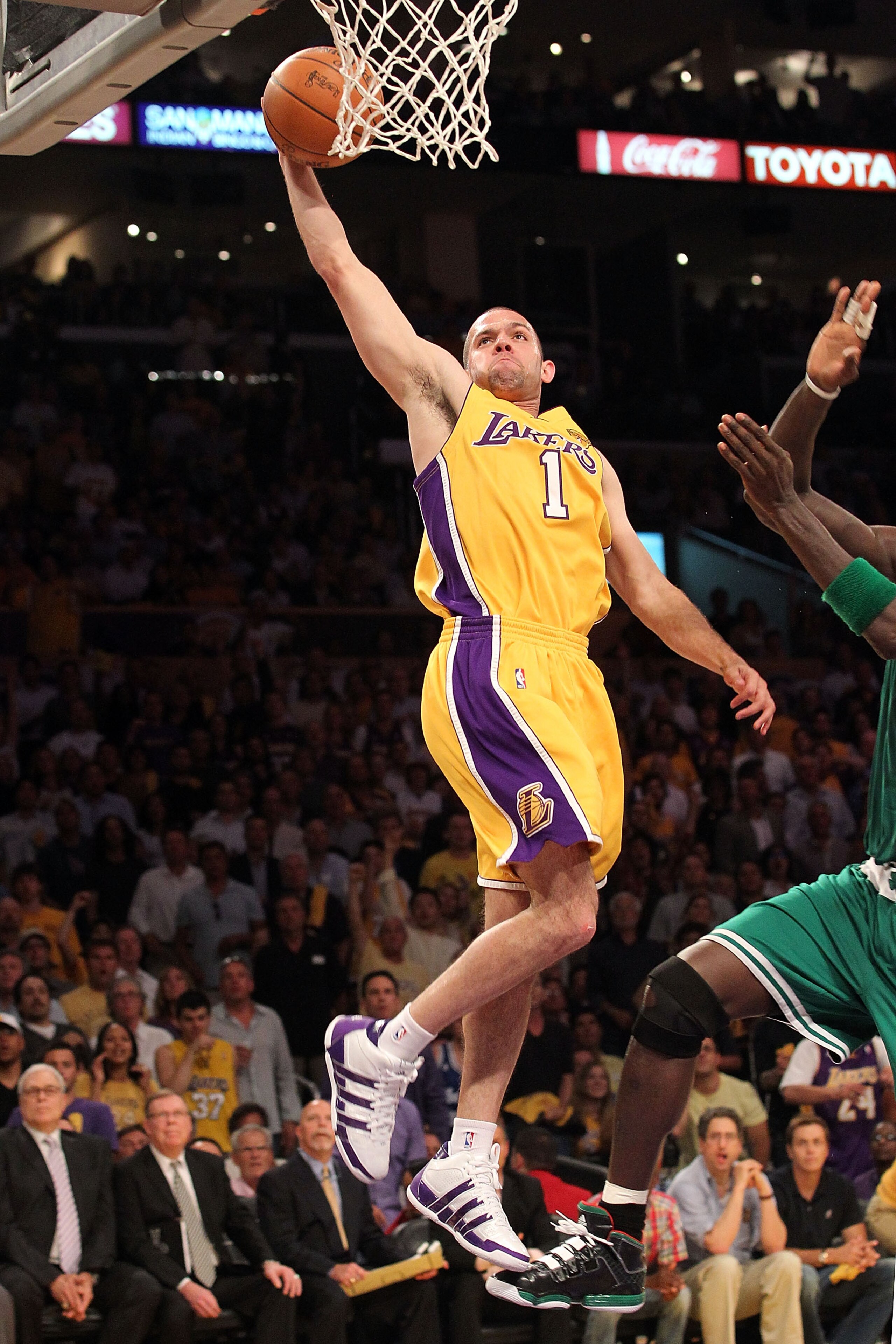 LOS ANGELES, CA - JUNE 15:  Jordan Farmar #1 of the Los Angeles Lakers dunks the ball in front of Kevin Garnett #5 of the Boston Celtics in Game Six of the 2010 NBA Finals at Staples Center on June 15, 2010 in Los Angeles, California.  NOTE TO USER: User