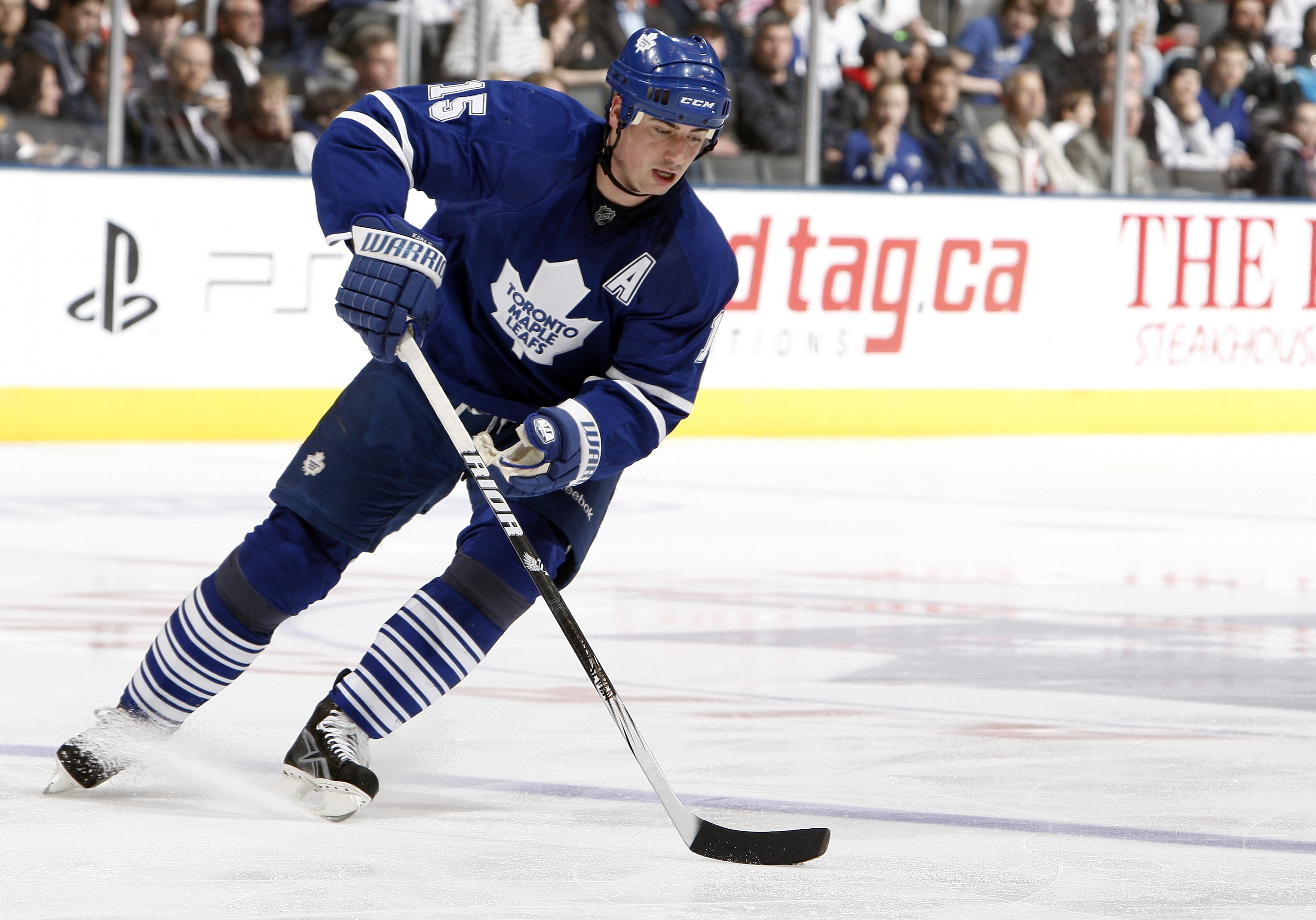 TORONTO - APRIL 6: Tomas Kaberle #15 of the Toronto Maple Leafs moves the puck during a NHL game against the Philadelphia Flyers at the Air Canada Centre on April 6, 2010 in Toronto, Ontario, Canada. (Photo by Abelimages/Getty Images)