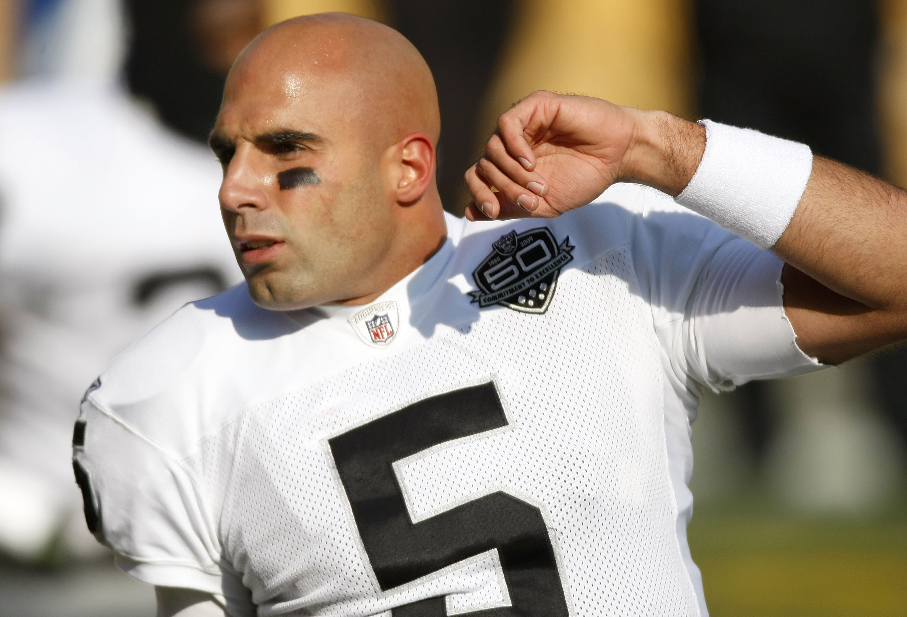 PITTSBURGH - DECEMBER 06: Bruce Gradkowski #5 of the Oakland Raiders stretches prior to playing the Pittsburgh Steelrs on December 6, 2009 at Heinz Field in Pittsburgh, Pennsylvania.  (Photo by Gregory Shamus/Getty Images)