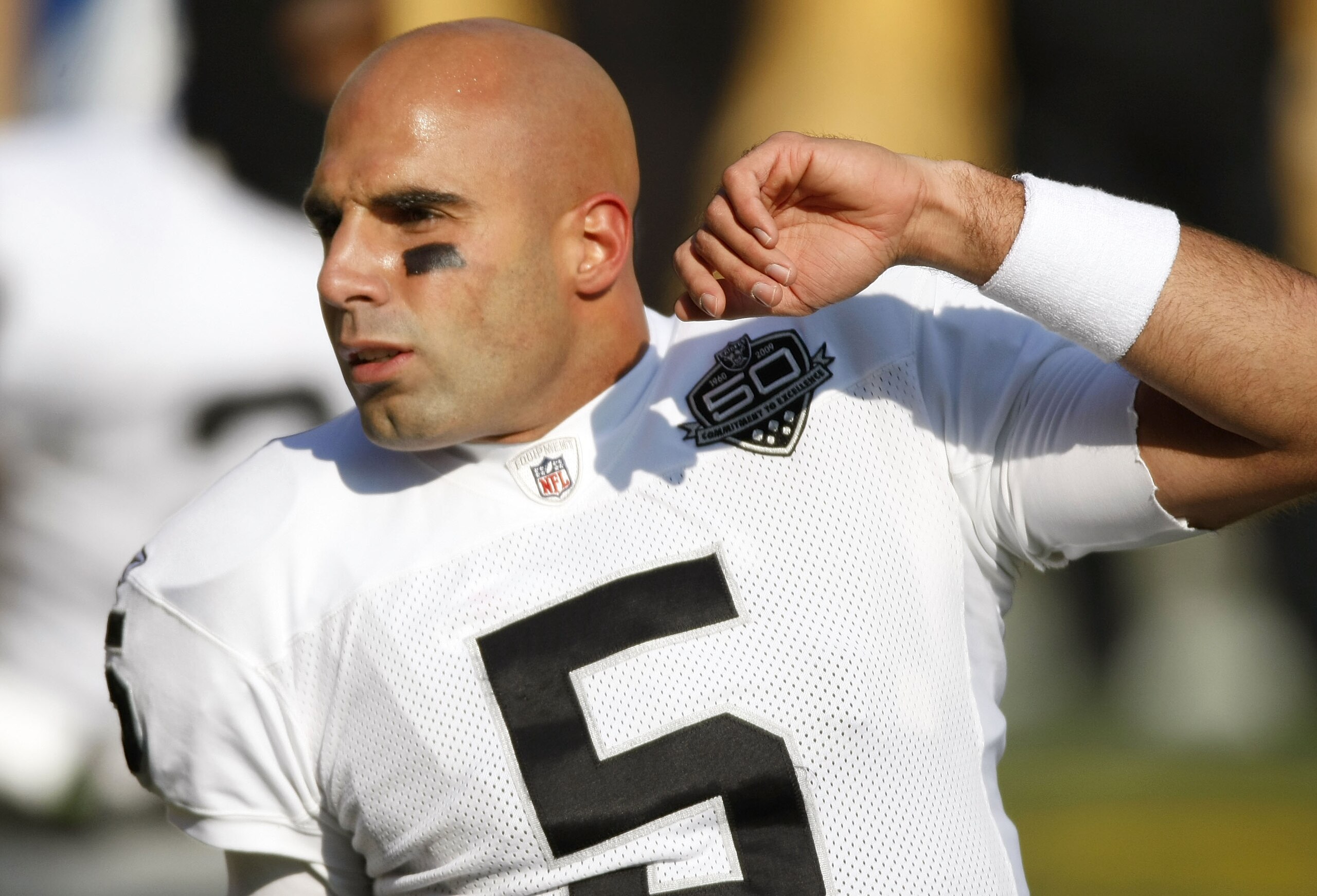 PITTSBURGH - DECEMBER 06: Bruce Gradkowski #5 of the Oakland Raiders stretches prior to playing the Pittsburgh Steelrs on December 6, 2009 at Heinz Field in Pittsburgh, Pennsylvania.  (Photo by Gregory Shamus/Getty Images)