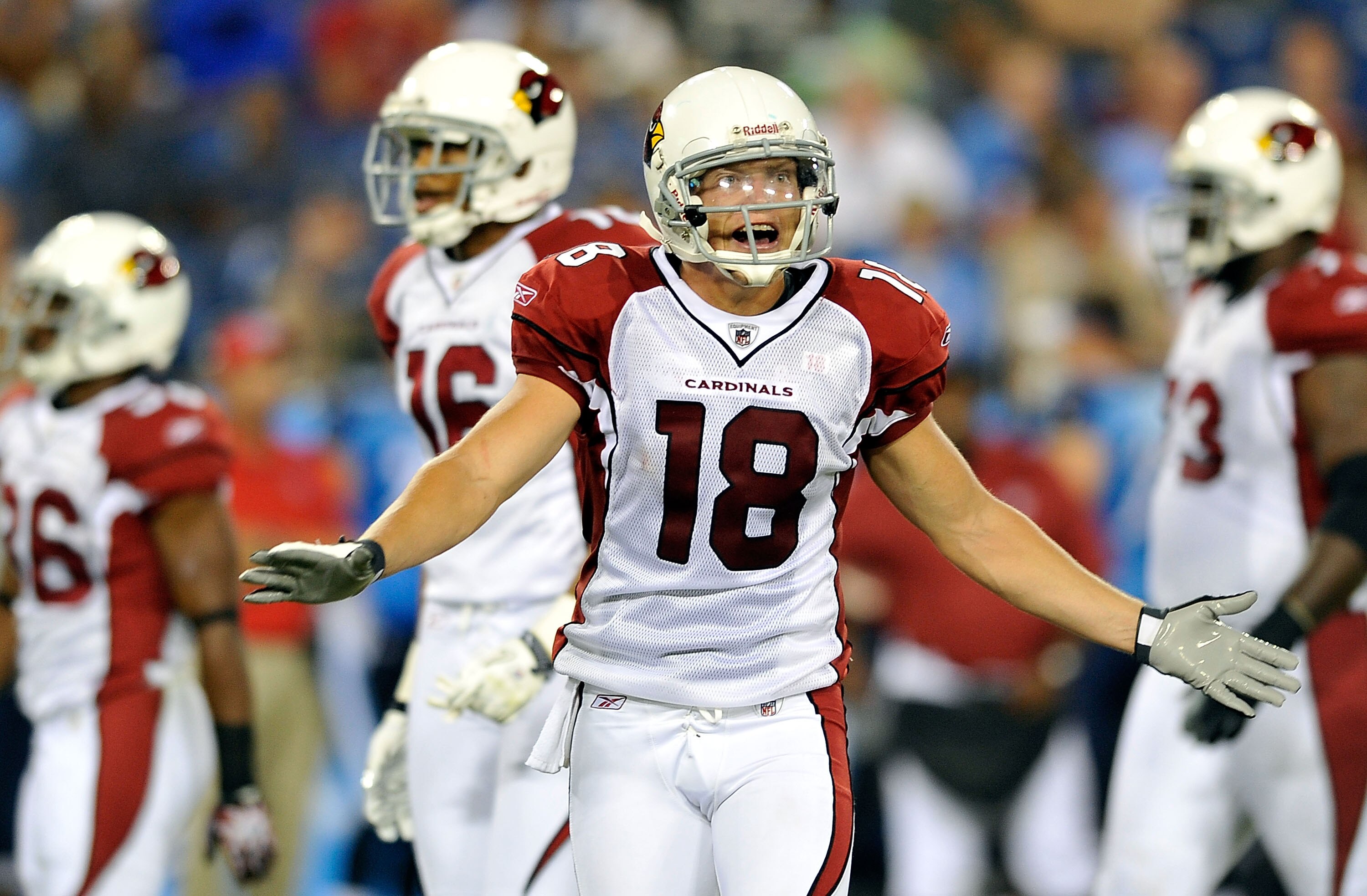 NASHVILLE, TN - AUGUST 23:  Max Komar #18 of the Arizona Cardinals attempts to explain to the sidelines that he wasn't really holding after being called for the penalty during a preseason game against the Tennessee Titans at LP Field on August 23, 2010 in