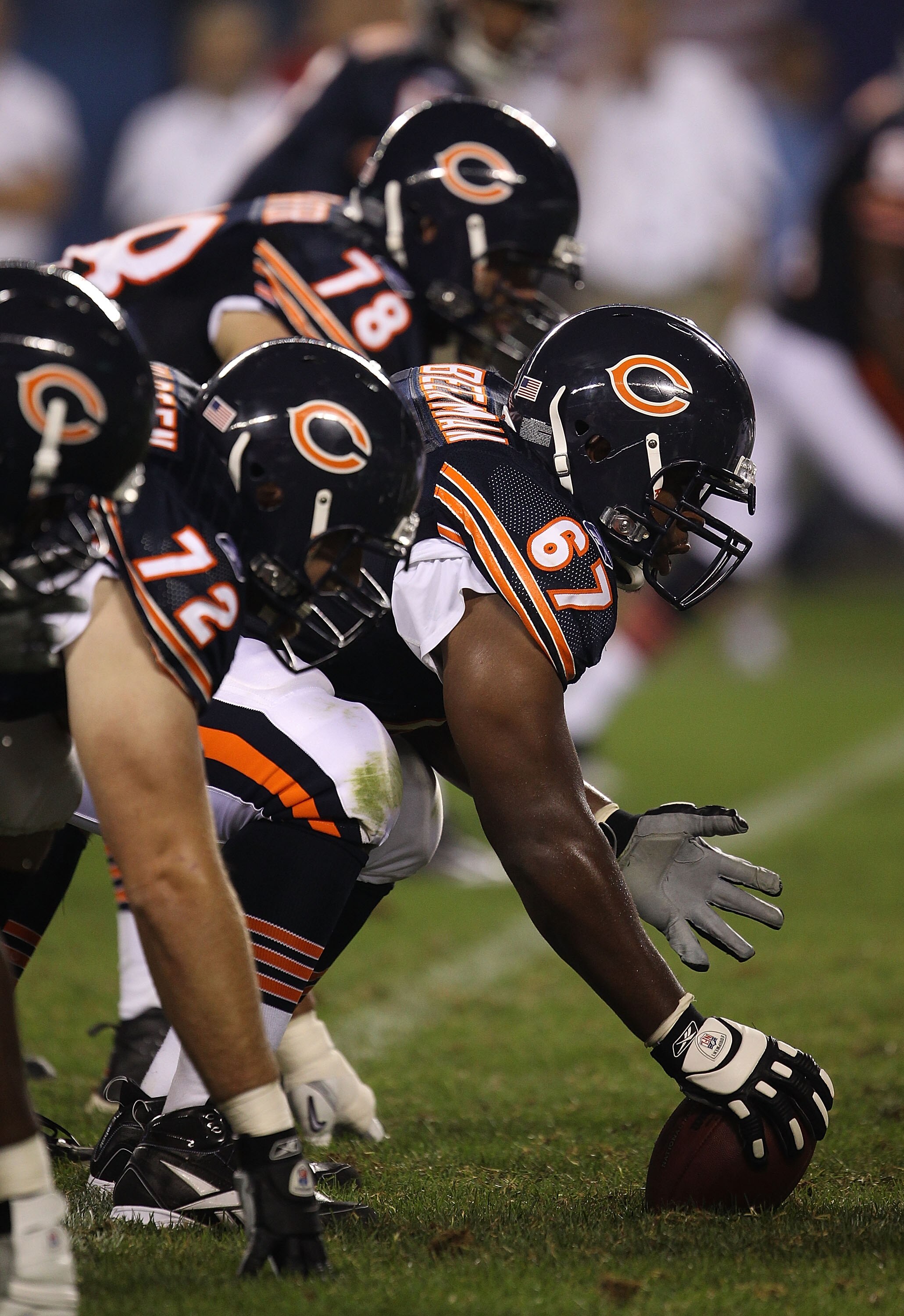 CHICAGO - AUGUST 21: Josh Beekman #67 of the Chicago Bears prepares to snap the ball during a preseason game against the Oakland Raiders at Soldier Field on August 21, 2010 in Chicago, Illinois. The Raiders defeated the Bears 32-17. (Photo by Jonathan Dan