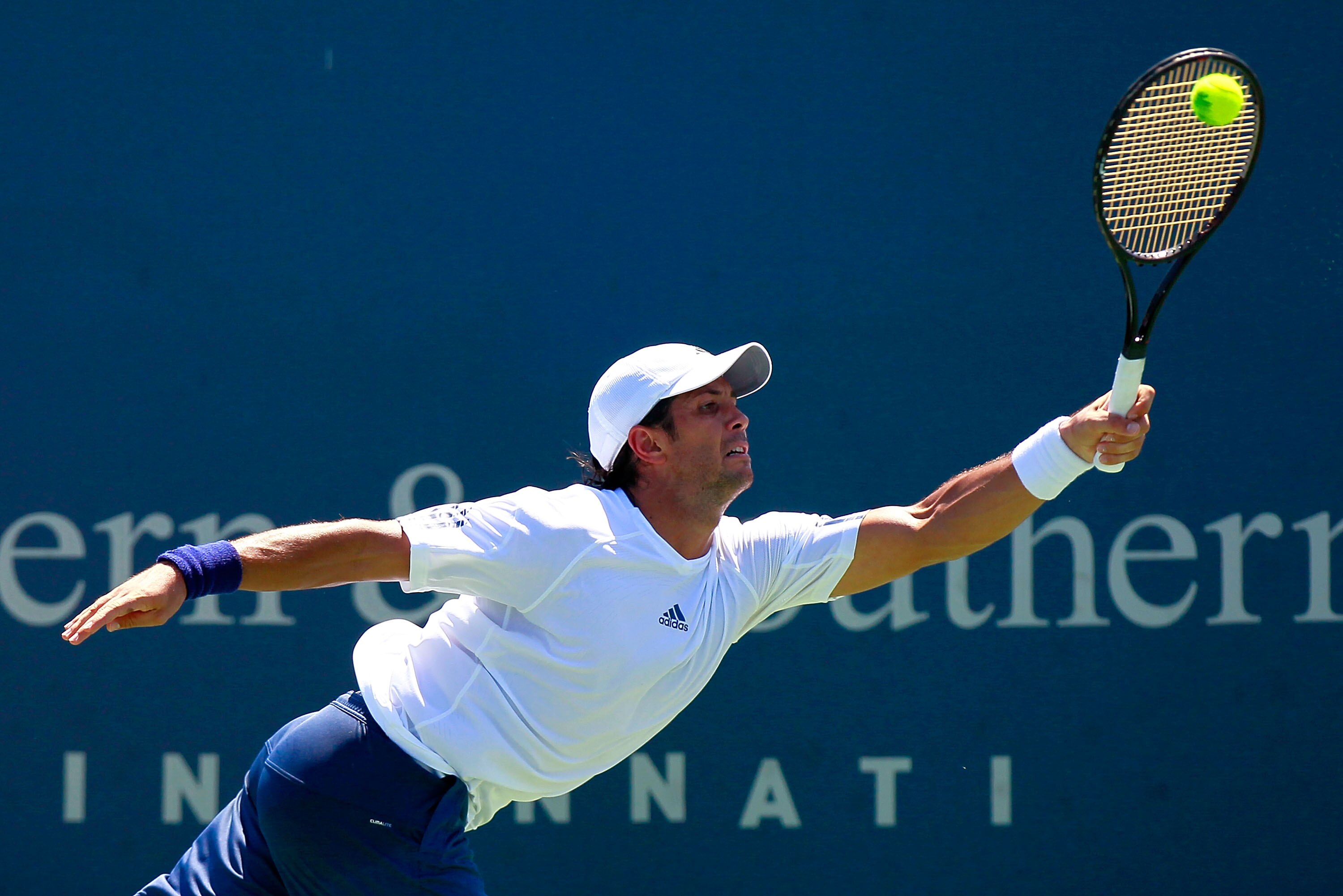 CINCINNATI - AUGUST 18:  Fernando Verdasco of Spain stretches to return a forehand to Mardy Fish during Day 3 of the Western & Southern Financial Group Masters at the Lindner Family Tennis Center on August 18, 2010 in Cincinnati, Ohio.  (Photo by Kevin C.