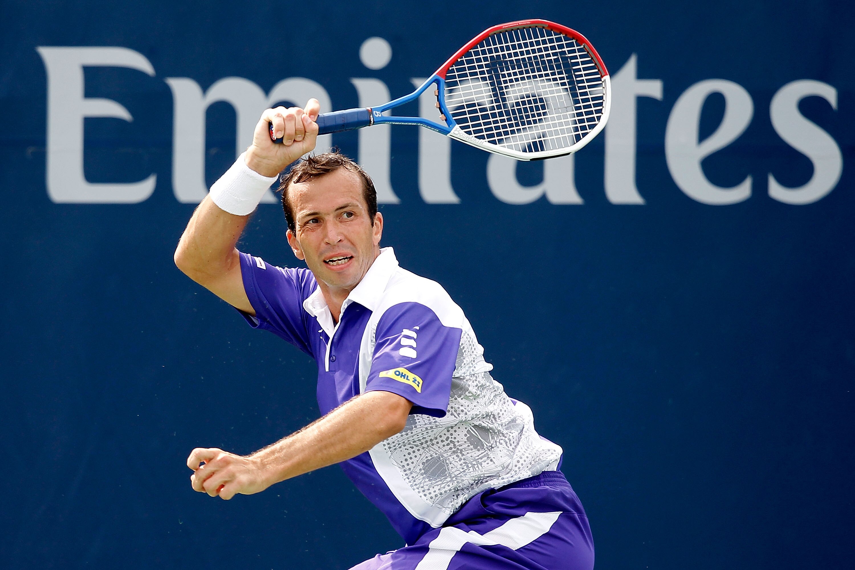 TORONTO, ON - AUGUST 10: Radek Stepanek of the Czech Republic returns a shot to Fabio Fognini of Italy during the Rogers Cup at the Rexall Centre on August 10, 2010 in Toronto, Canada.  (Photo by Matthew Stockman/Getty Images)