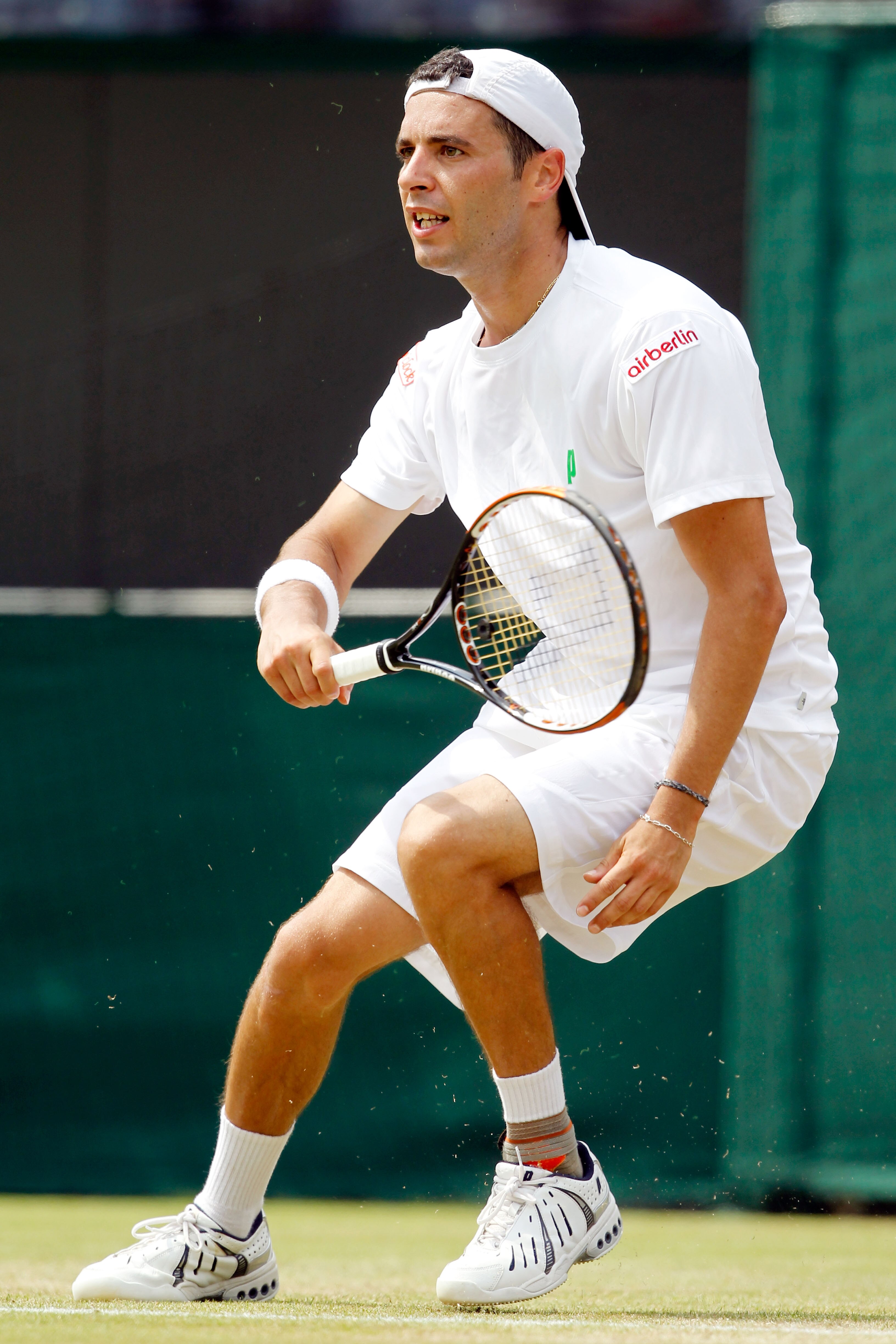 LONDON, ENGLAND - JUNE 25:  Albert Montanes of Spain in action against Novak Djokovic of Serbia on Day Five of the Wimbledon Lawn Tennis Championships at the All England Lawn Tennis and Croquet Club on June 25, 2010 in London, England.  (Photo by Matthew 