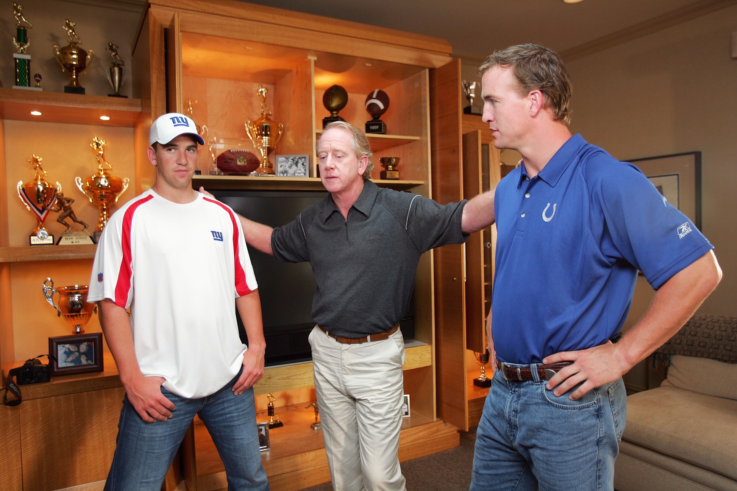 NORTH CALDWELL, NJ - JUNE 26:  (L-R) Eli, Archie and Peyton Manning on the set during a Reebok commercial shoot on June 26, 2006 in North Caldwell, New Jersey.   (Photo by Ezra Shaw/Getty Images for Reebok)