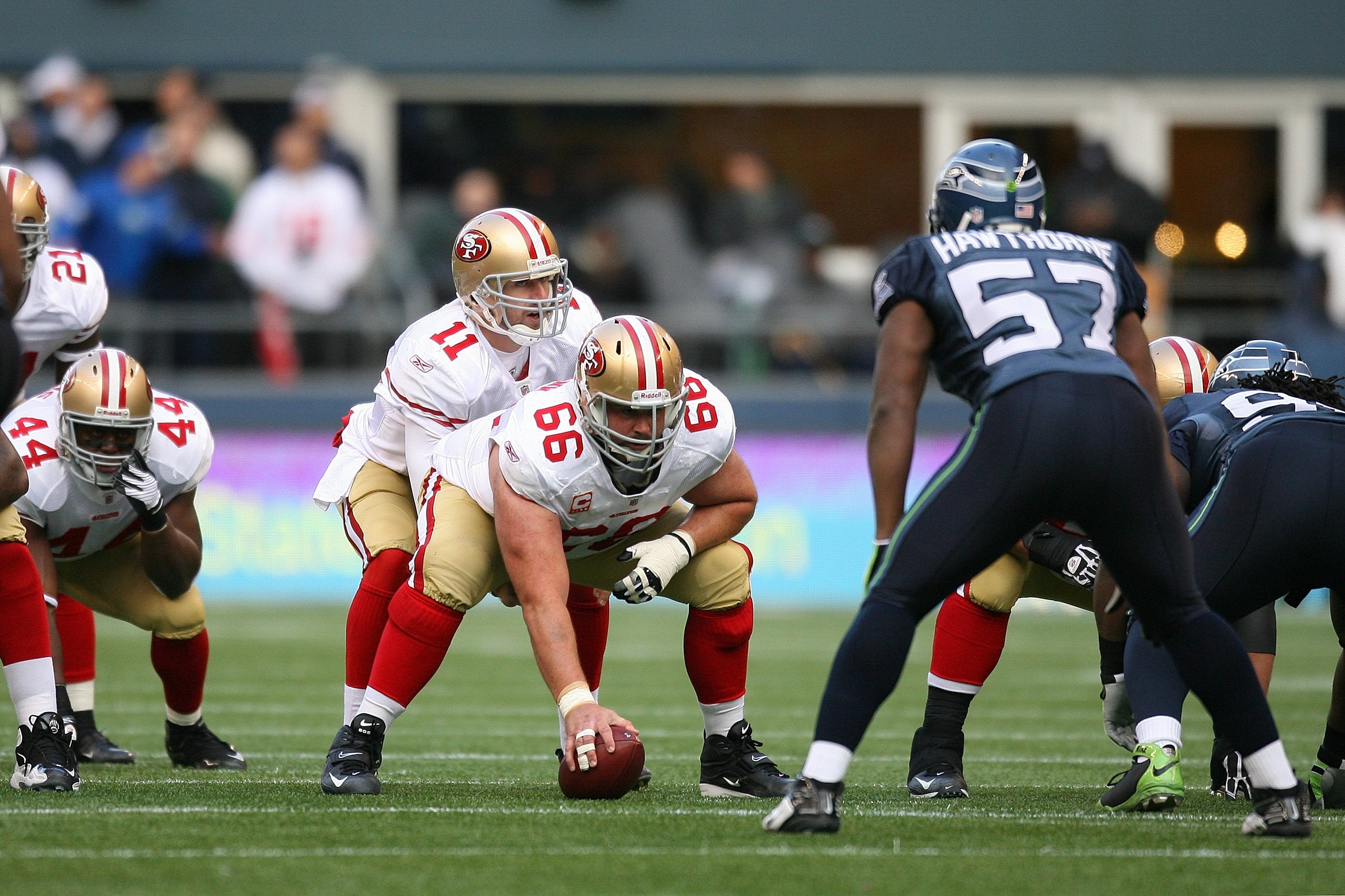SEATTLE - DECEMBER 6:  Alex Smith #11 of the San Francisco 49ers looks over the defensive formation during their NFL game against the Seattle Seahawks on December 6, 2009 at Qwest Field in Seattle, Washington. The Seahawks defeated the 49ers 20-17. (Photo