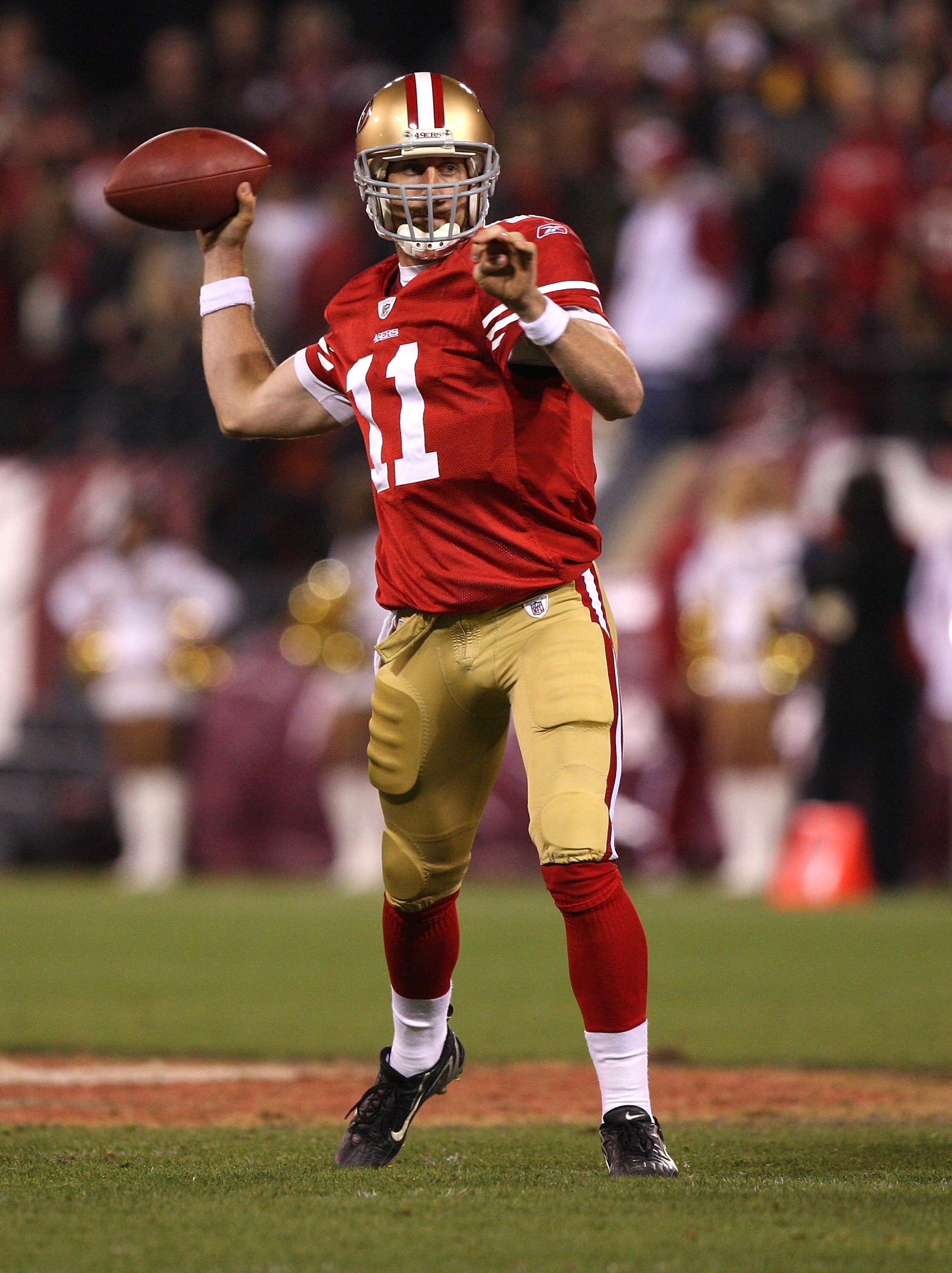 SAN FRANCISCO - DECEMBER 14:  Alex Smith #11 of the San Francisco 49ers in action against the Arizona Cardinals at Candlestick Park on December 14, 2009 in San Francisco, California.  (Photo by Jed Jacobsohn/Getty Images)