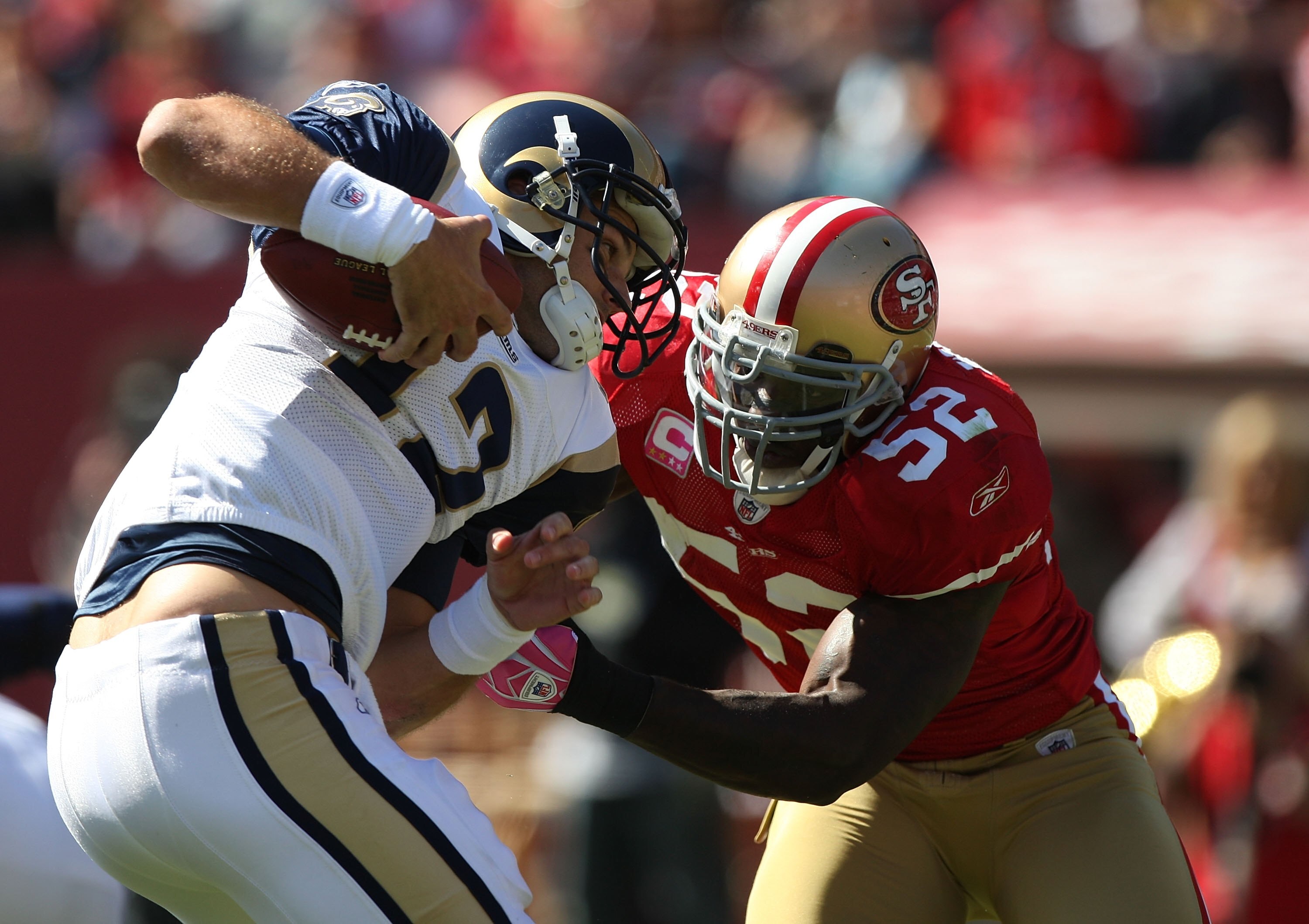 SAN FRANCISCO - OCTOBER 04:  Patrick Willis #52 of the San Francisco 49ers sacks Kyle Boller #12 of the St. Louis Rams during an NFL game on October 4, 2009 at Candlestick Park in San Francisco, California.  (Photo by Jed Jacobsohn/Getty Images)