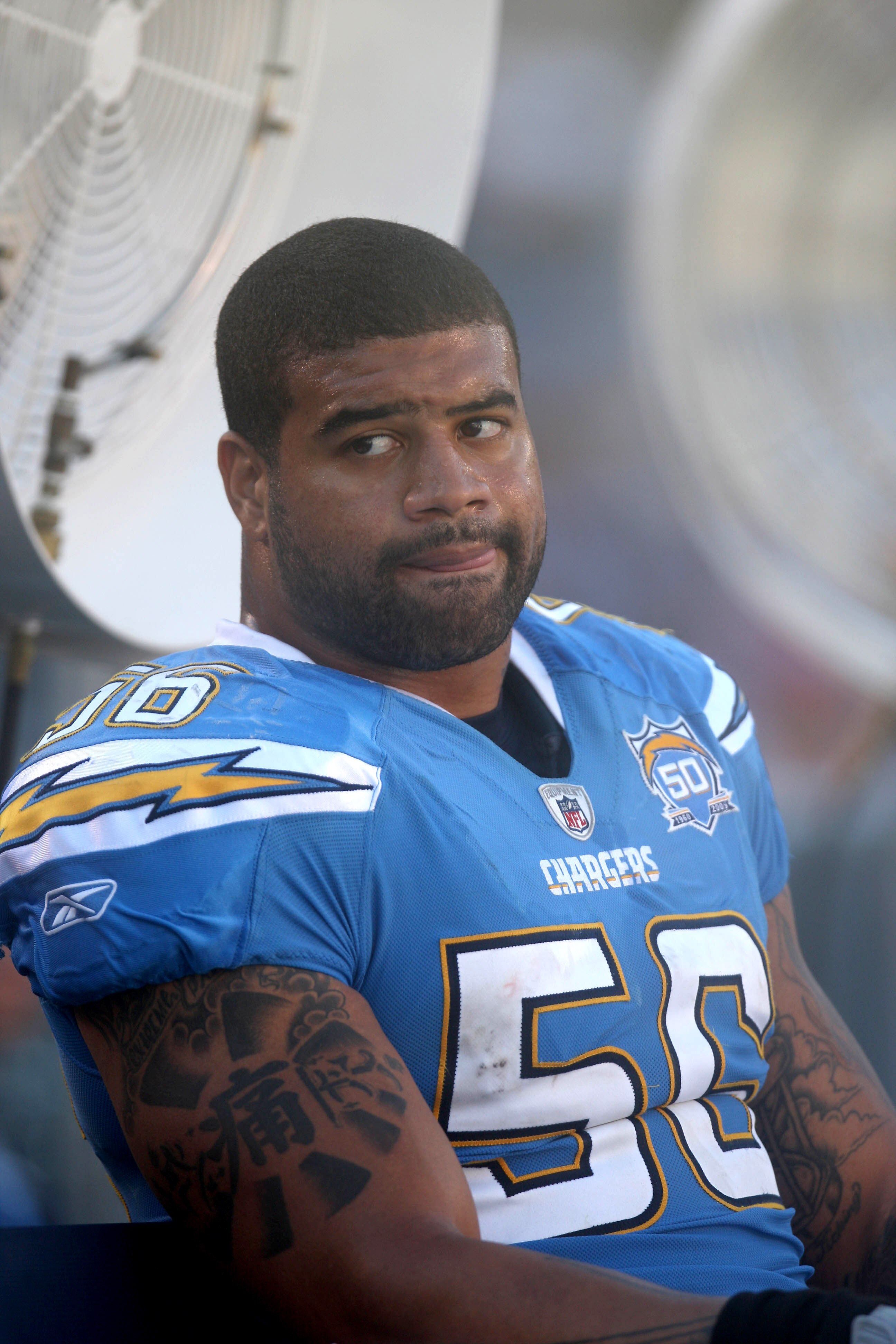 SAN DIEGO, CA - NOVEMBER 1:  Shawne Merriman #56 of the San Diego Chargers looks on from the sidelines during the first half of the game against the Oakland Raiders on November 1, 2009 at Qualcomm Stadium in San Diego, California. (Photo by Donald Miralle