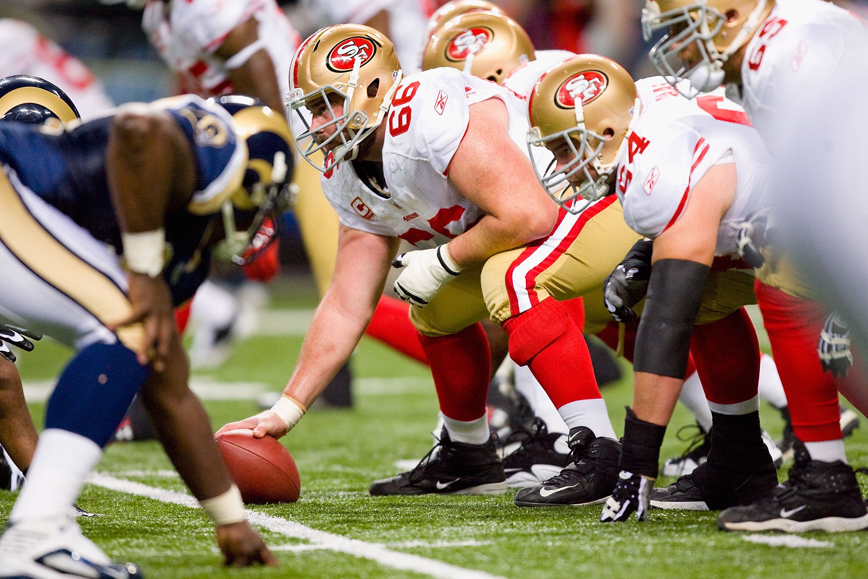 ST. LOUIS - JANUARY 3:  Center Eric Heitmann #66 of the San Francisco 49ers gets ready on the line during the game against the St. Louis Rams at the Edward Jones Dome on January 3, 2010 in St. Louis, Missouri.  The 49ers beat the Rams 28-6.  (Photo by Dil