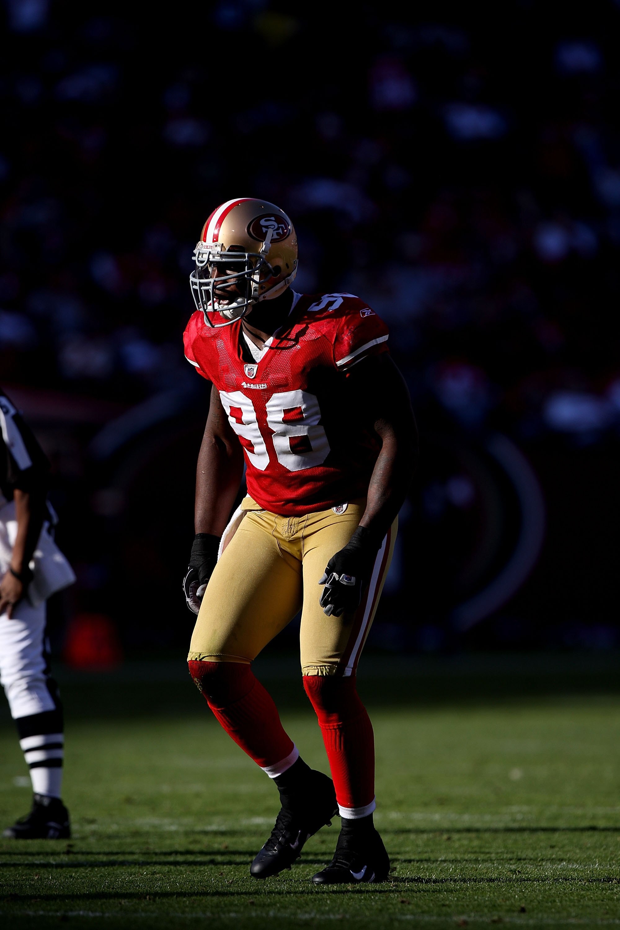 SAN FRANCISCO - NOVEMBER 08:  Parys Haralson #98 of the San Francisco 49ers in action against the Tennessee Titans during an NFL game on November 8, 2009 at Candlestick Park in San Francisco, California.  (Photo by Jed Jacobsohn/Getty Images)