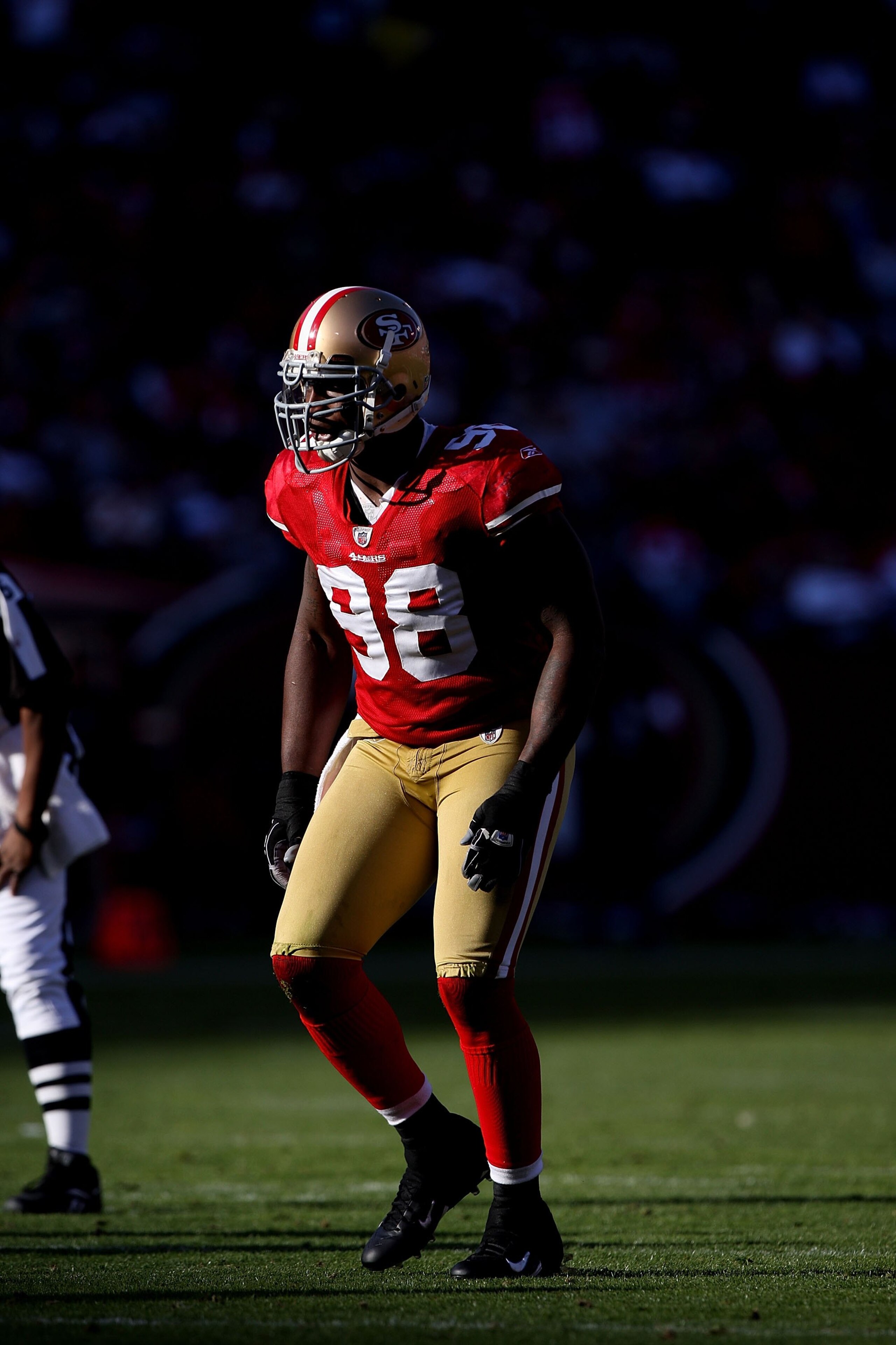 SAN FRANCISCO - NOVEMBER 08:  Parys Haralson #98 of the San Francisco 49ers in action against the Tennessee Titans during an NFL game on November 8, 2009 at Candlestick Park in San Francisco, California.  (Photo by Jed Jacobsohn/Getty Images)