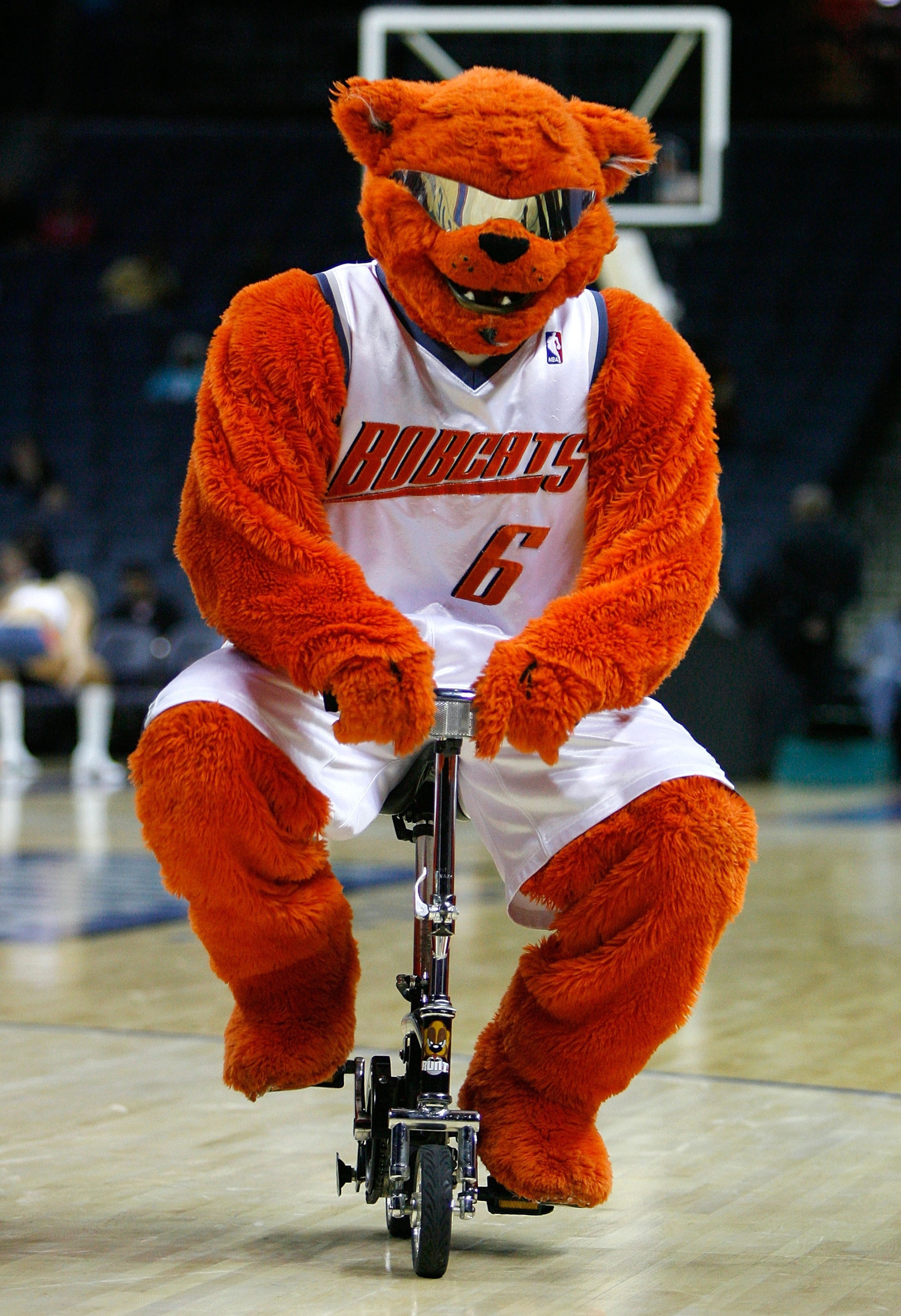 CHARLOTTE, NC - OCTOBER 15: The Charlotte Bobcats mascot Rufus rides a miniature bicycle around the arena during the second half of the Charlotte Bobcats preseason game against the New Jersey Nets at Charlotte Bobcats Arena October 15, 2007 in Charlotte, CHARLOTTE, NC - OCTOBER 15: The Charlotte Bobcats mascot Rufus rides a miniature bicycle around the arena during the second half of the Charlotte Bobcats preseason game against the New Jersey Nets at Charlotte Bobcats Arena October 15, 2007 in Charlotte,