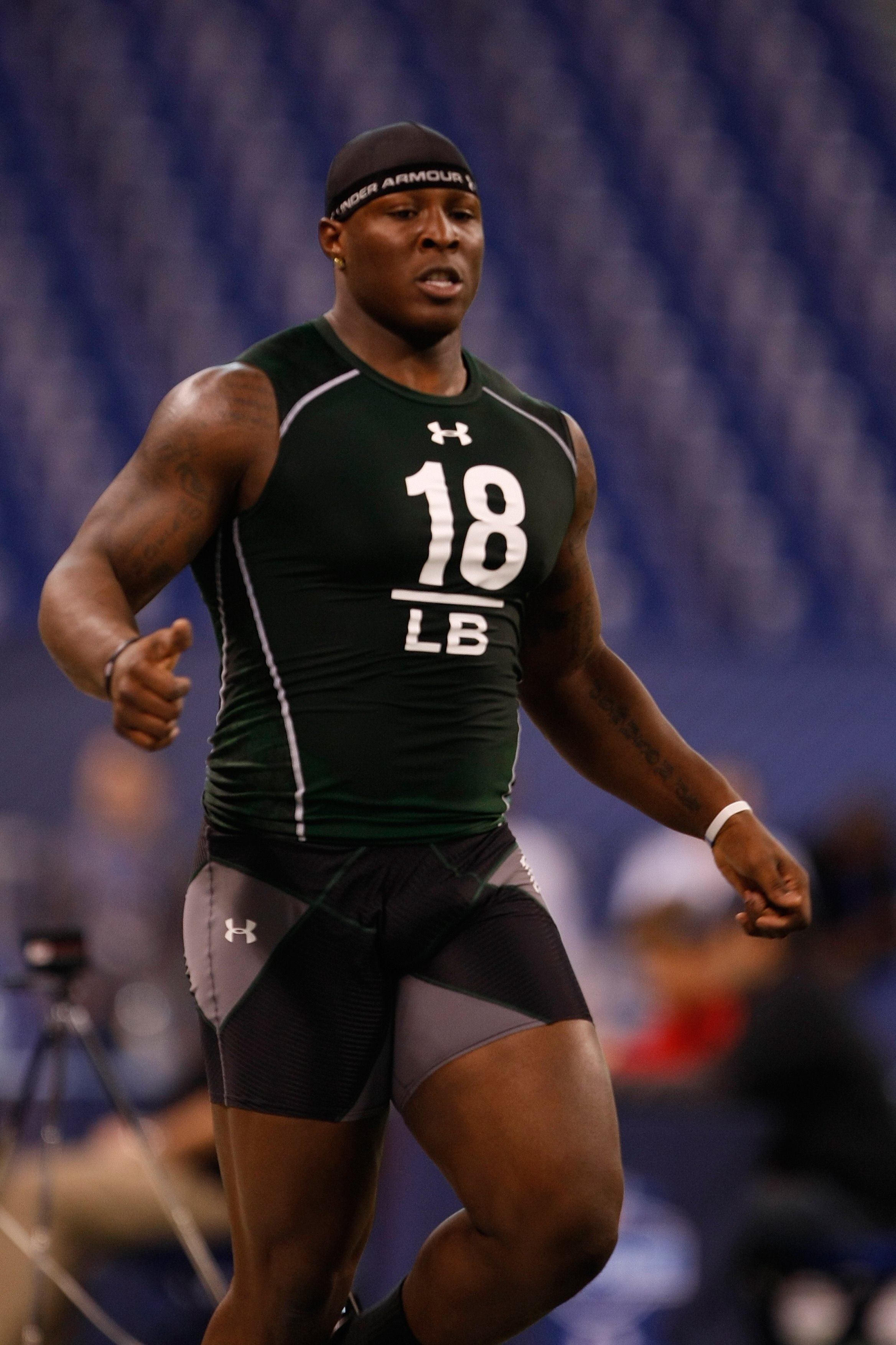 INDIANAPOLIS, IN - MARCH 1: Linebacker Micah Johnson of Kentucky runs the 40 yard dash during the NFL Scouting Combine presented by Under Armour at Lucas Oil Stadium on March 1, 2010 in Indianapolis, Indiana. (Photo by Scott Boehm/Getty Images)