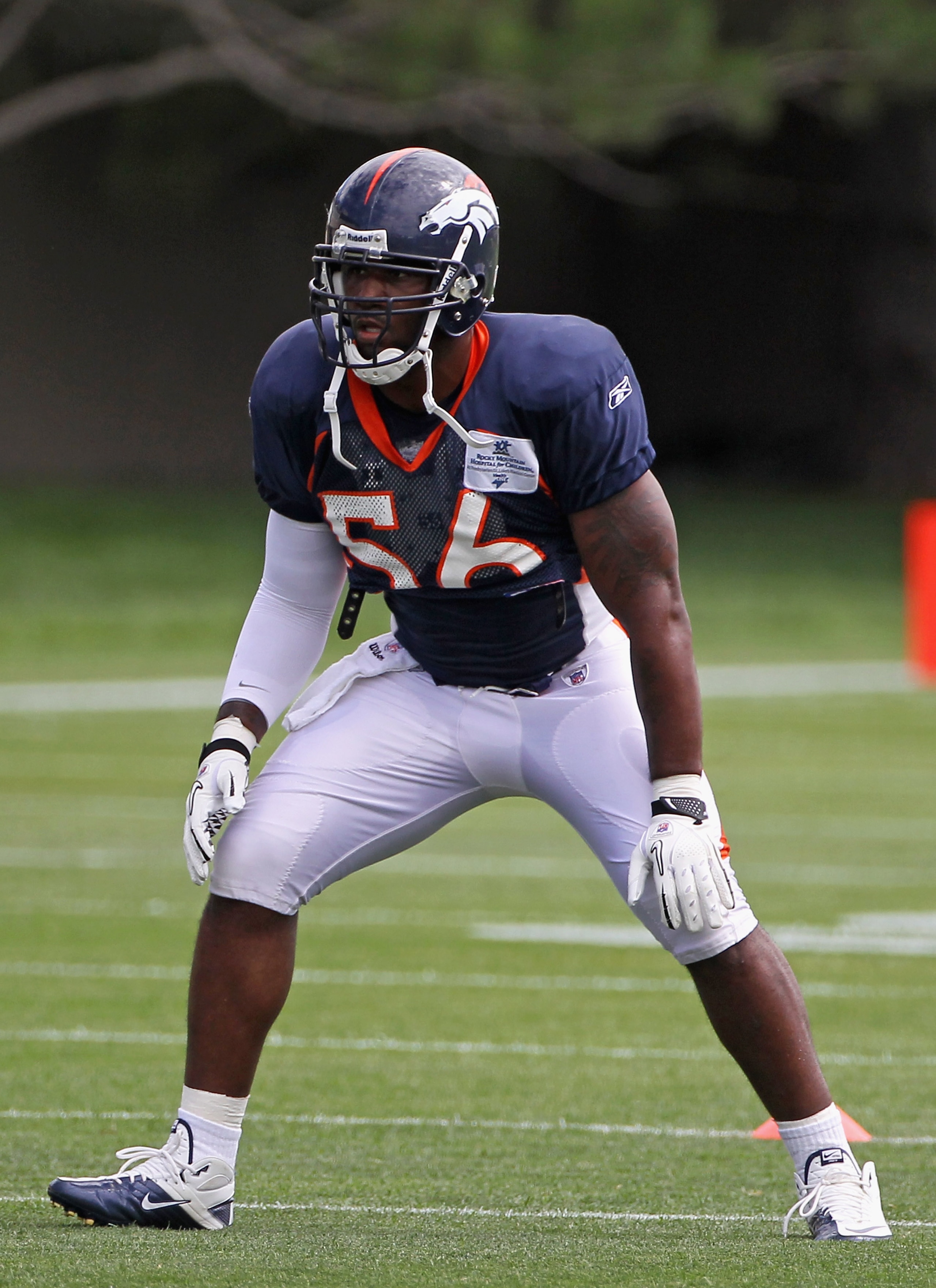 ENGLEWOOD, CO - AUGUST 05:  Linebacker Robert Ayers #56 of the Denver Bronocs takes part in practice during training camp at Dove Valley on August 5, 2010 in Englewood, Colorado.  (Photo by Doug Pensinger/Getty Images)