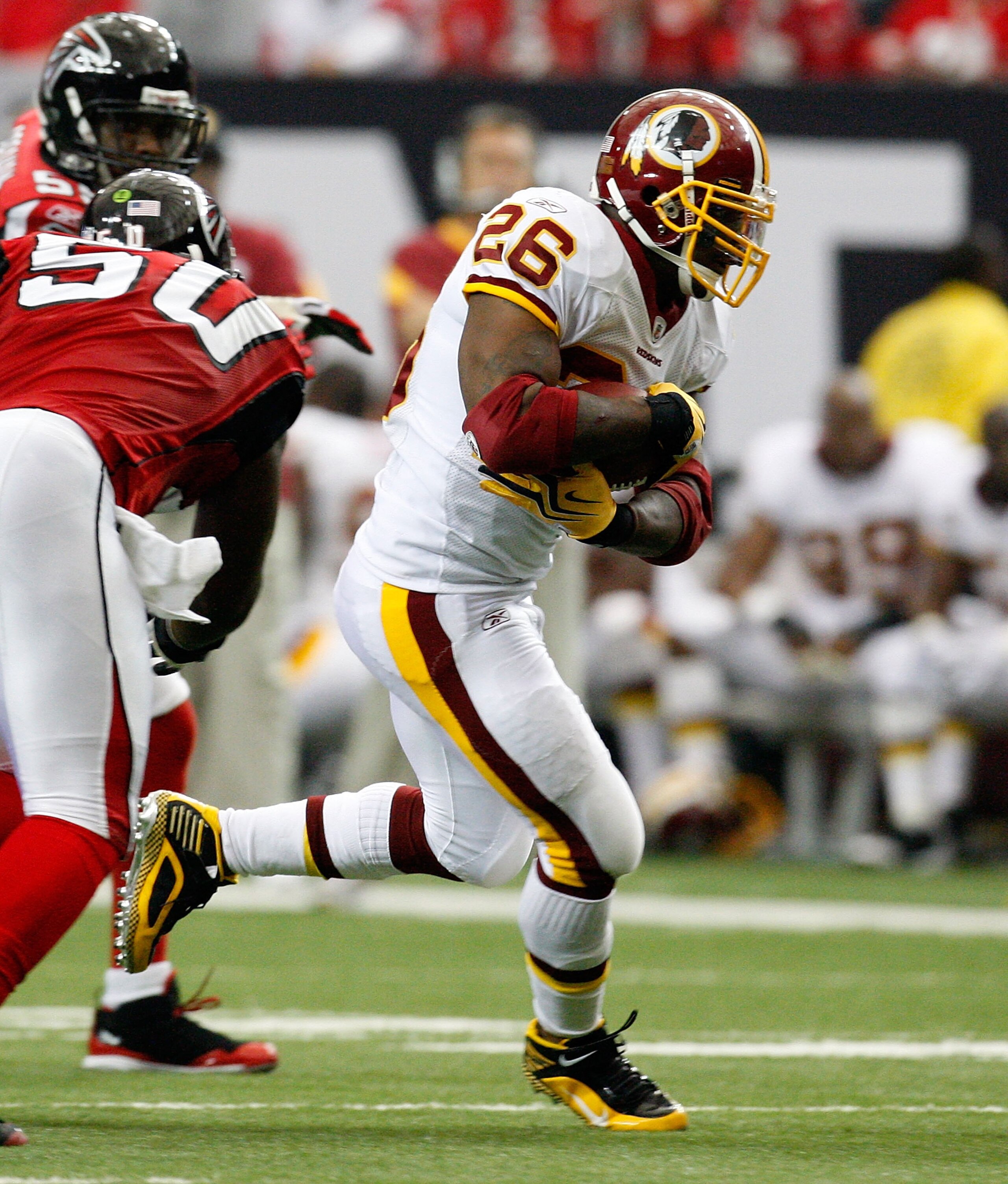 ATLANTA - NOVEMBER 08:  Clinton Portis #26 of the Washington Redskins against of the Atlanta Falcons at Georgia Dome on November 8, 2009 in Atlanta, Georgia.  (Photo by Kevin C. Cox/Getty Images)