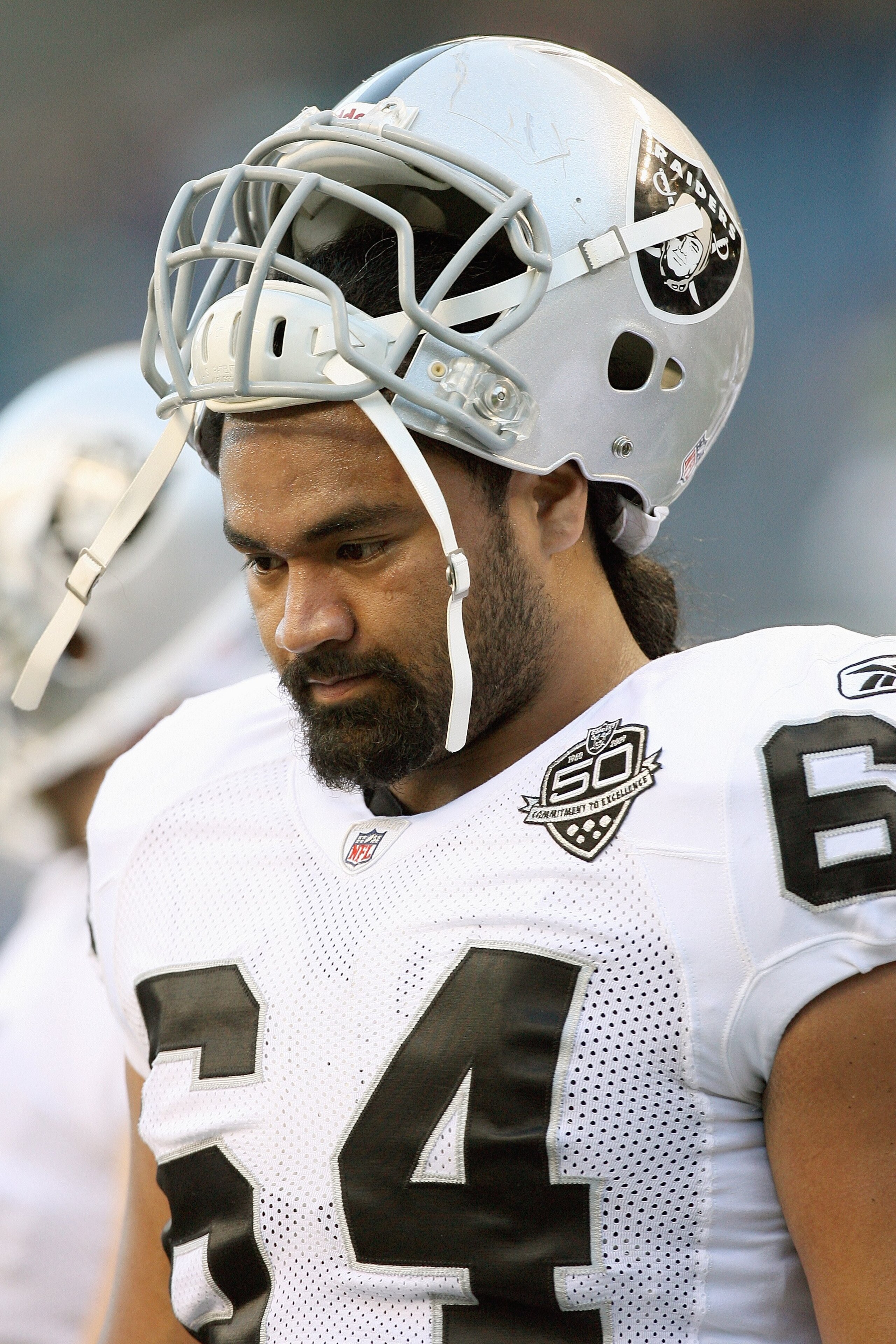 SEATTLE - SEPTEMBER 03:  Samson Satele #64 of the Oakland Raiders stands on the field before the game against the Seattle Seahawks on September 3, 2009 at Qwest Field in Seattle, Washington. (Photo by Otto Greule Jr/Getty Images)