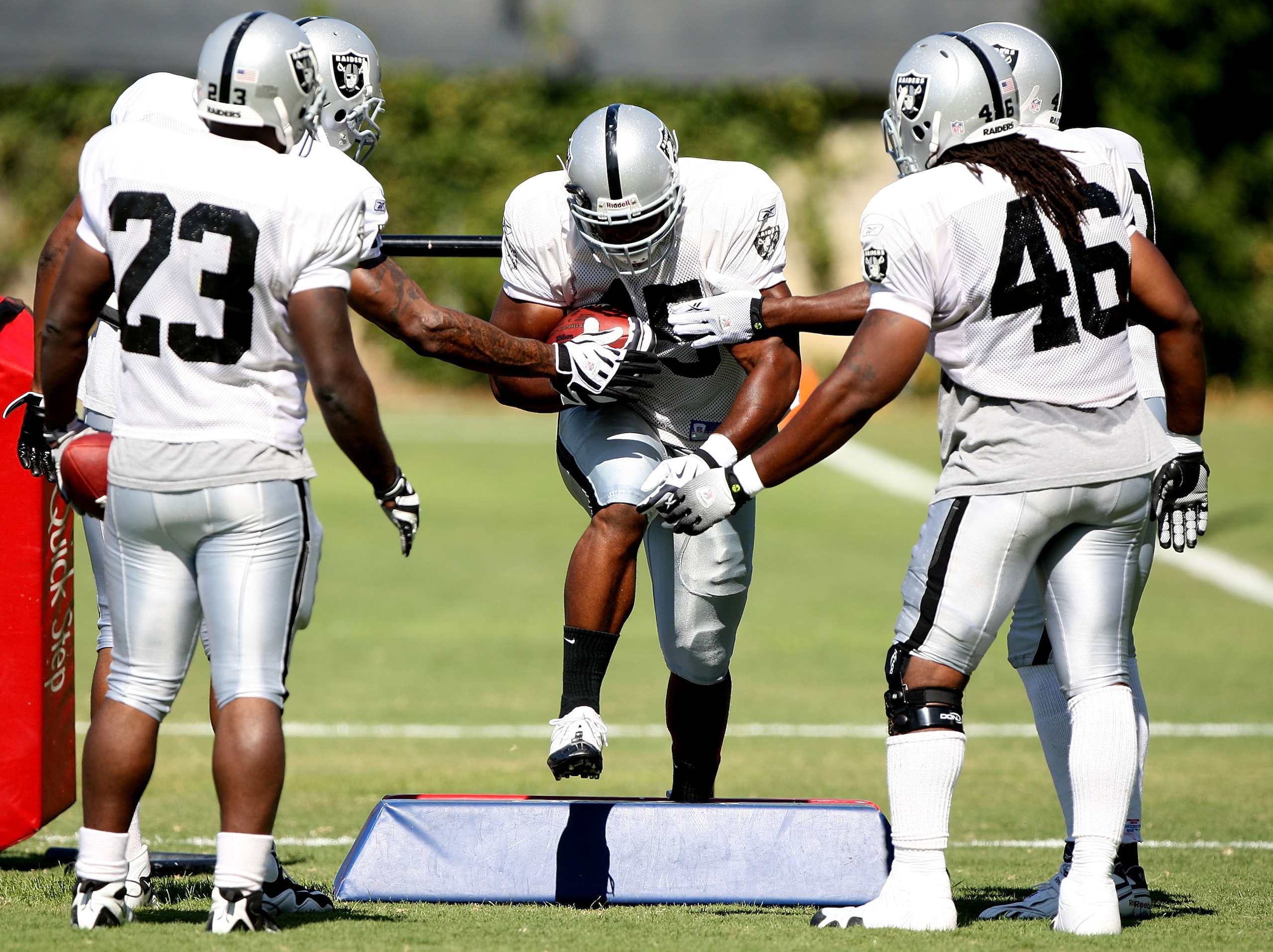 NAPA, CA - AUGUST 05: Marcel Reece #45 runs with the ball during the Oakland Raiders Training Camp at the Napa Valley Marriott on August 5, 2009 in Napa, California.  (Photo by Jed Jacobsohn/Getty Images)