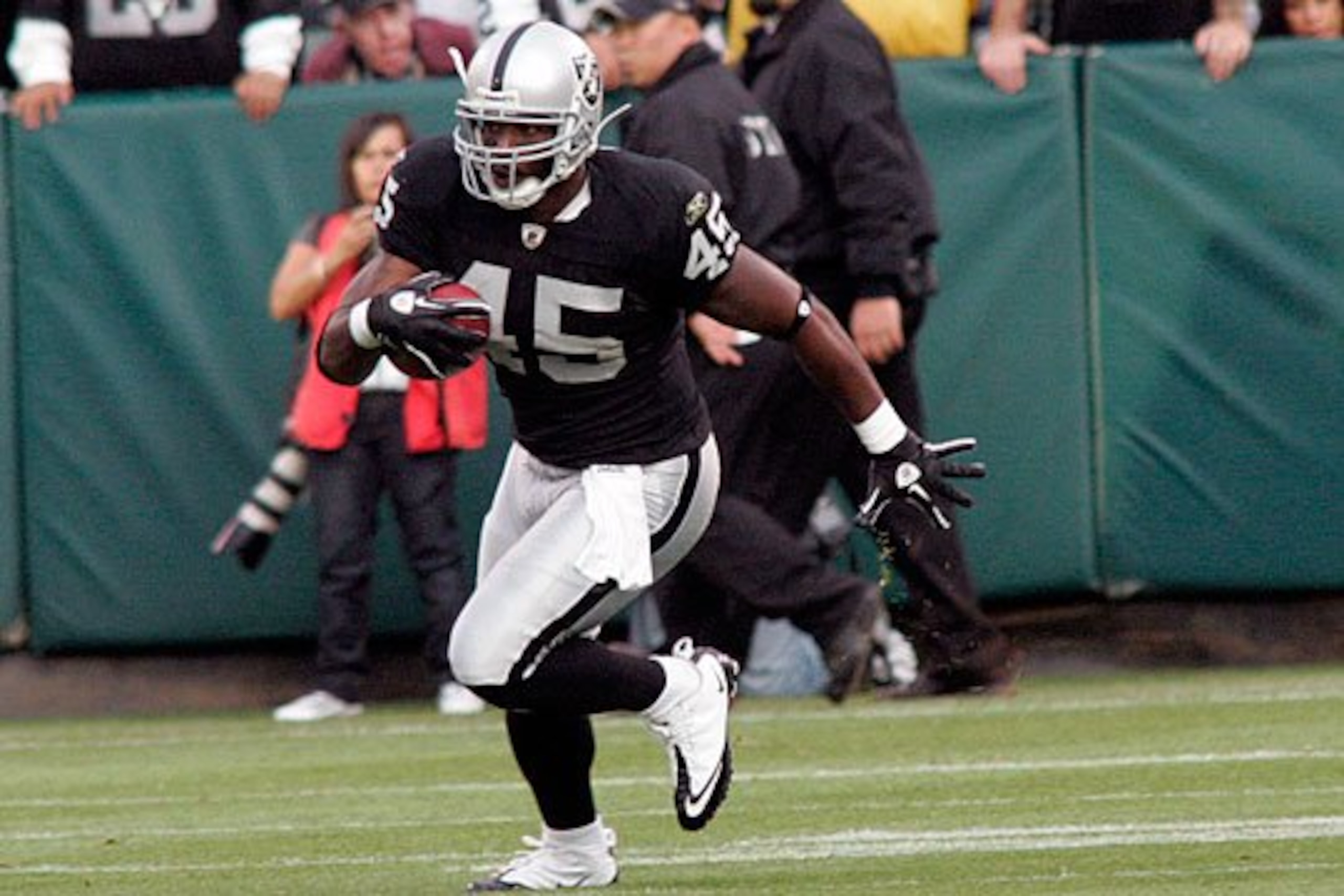 Marcel Reece makes another big run after catch.