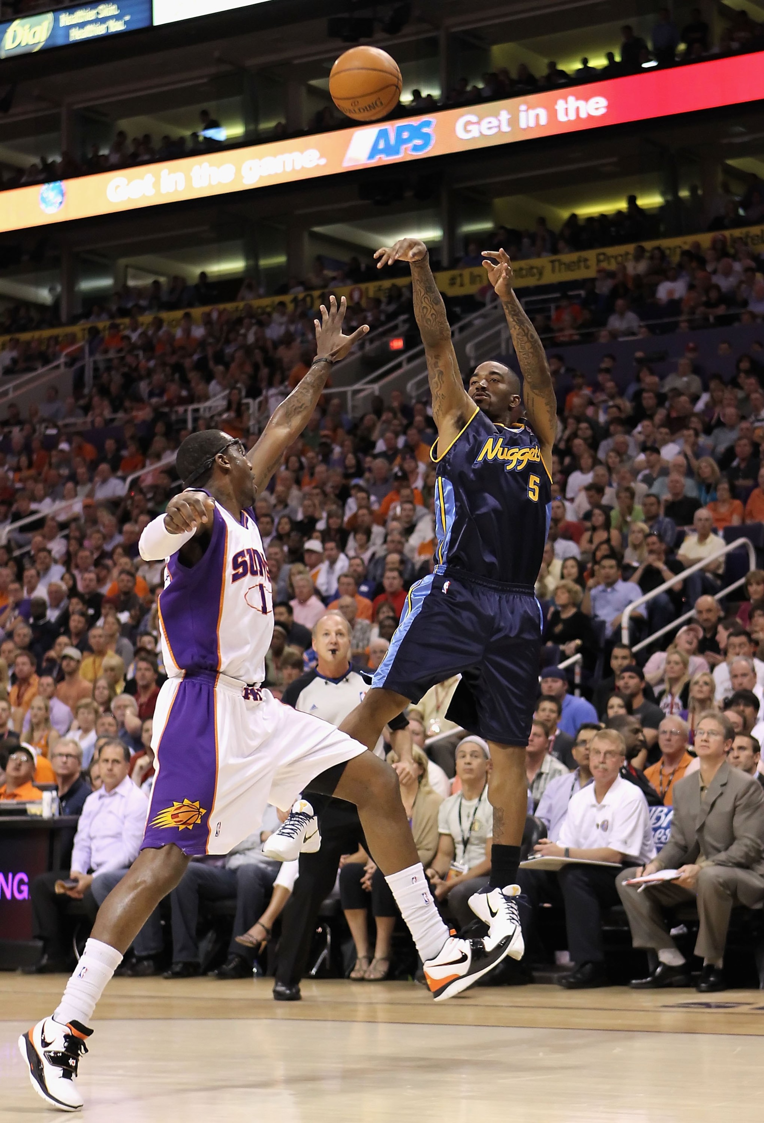 PHOENIX - APRIL 13:  J.R. Smith #5 of the Denver Nuggets puts up a shot during the NBA game against the Phoenix Suns at US Airways Center on April 13, 2010 in Phoenix, Arizona. The Suns defeated the Nuggets 123-101.  NOTE TO USER: User expressly acknowled