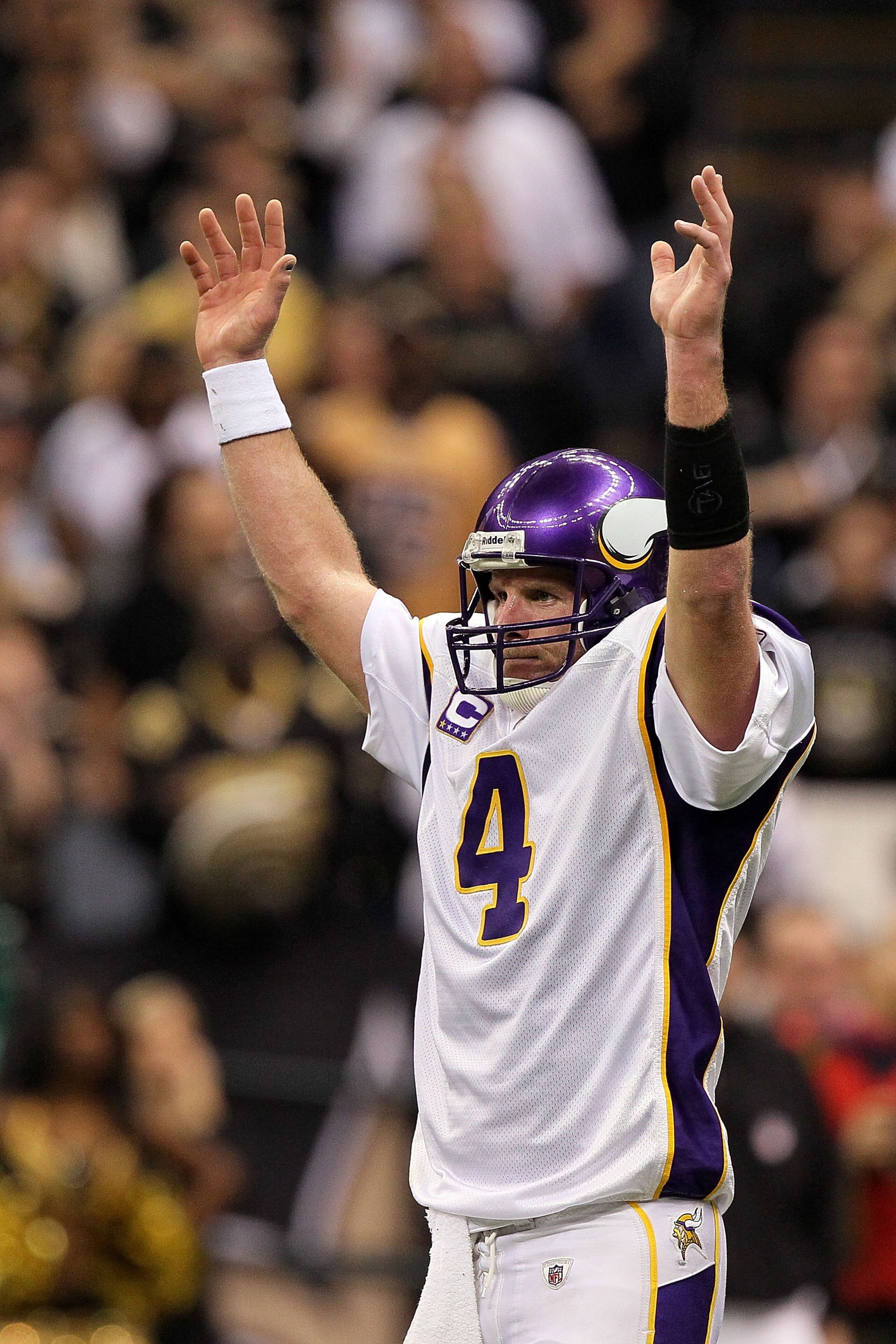 NEW ORLEANS - JANUARY 24:  Brett Favre #4 of the Minnesota Vikings reacts after the Vikings scored a touchdown against the New Orleans Saints during the NFC Championship Game at the Louisiana Superdome on January 24, 2010 in New Orleans, Louisiana. The Sa