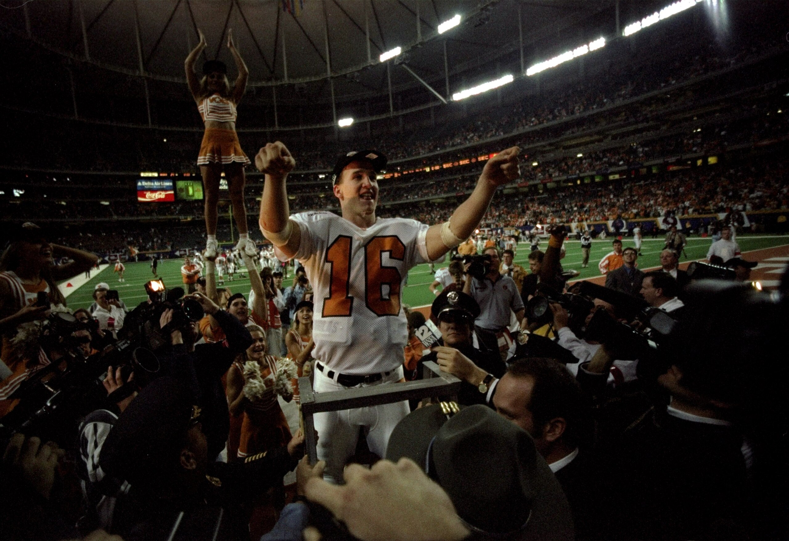 6 Dec 1997: Quarterback Peyton Manning #16 of Tennessee celebrates after the Volunteers 30-29 win over Auburn in the SEC Championship at the Georgia Dome in Atlanta, Georgia.