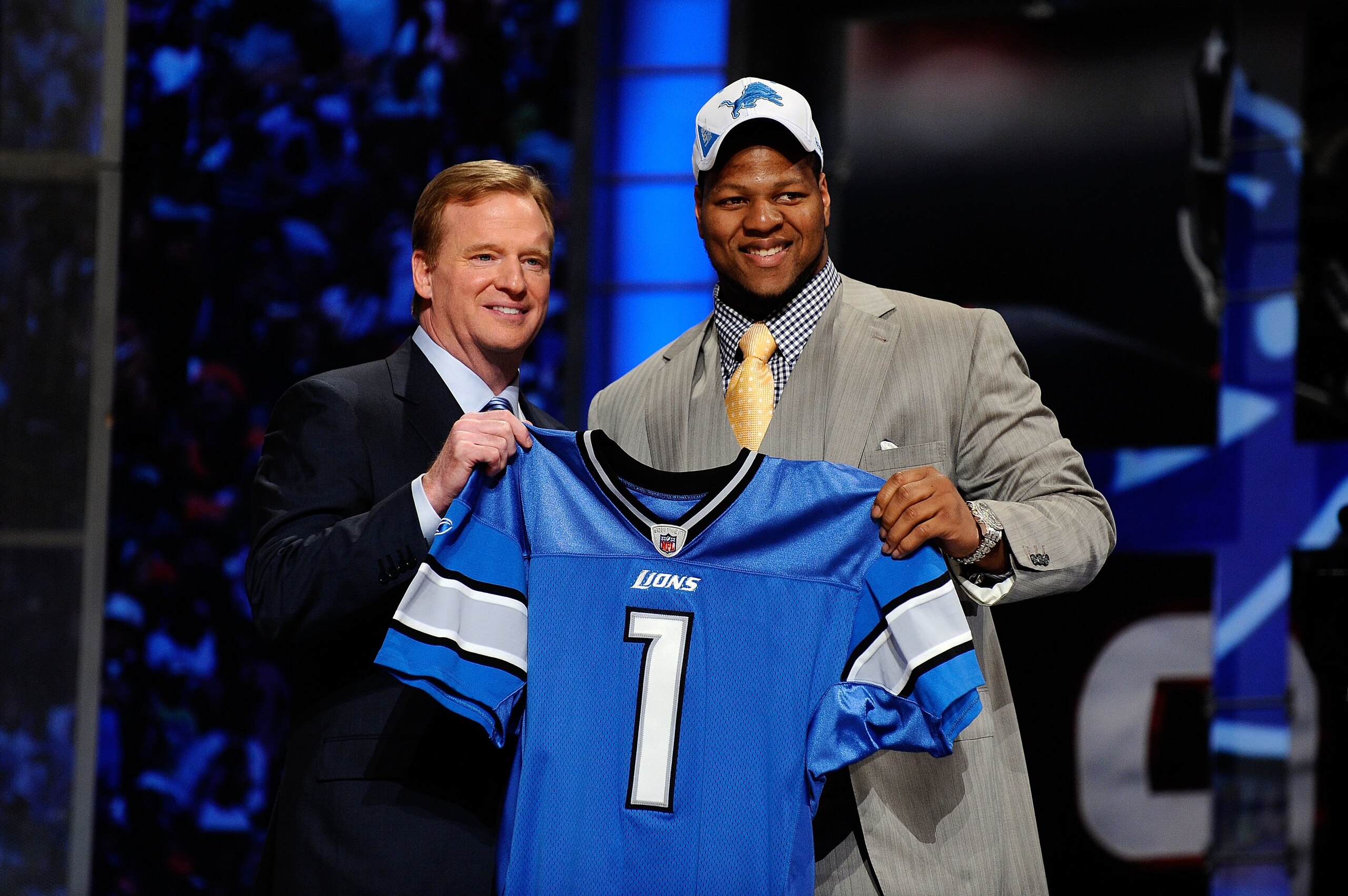NEW YORK - APRIL 22:  Ndamukong Suh (R) from the Nebraska Cornhuskers poses with NFL Commissioner Roger Goodell as they hold up a Detroit Lions jersey after Suh was selected by the Lions number 2 overall during the first round of the 2010 NFL Draft at Rad