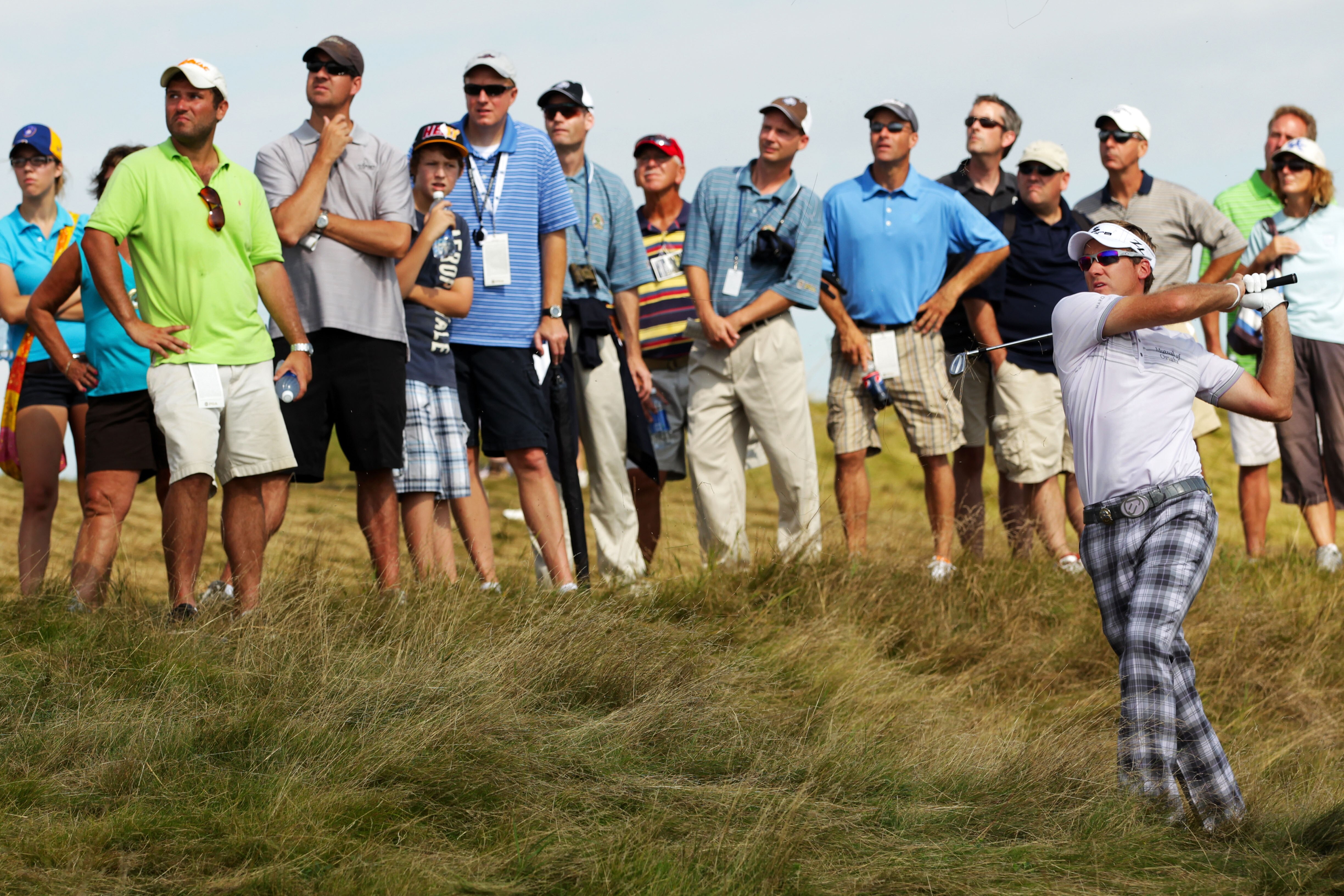 KOHLER, WI - AUGUST 14:  Ian Poulter of England watches his a shot from the rough on the 15th hole during the continuation of the second round of the 92nd PGA Championship on the Straits Course at Whistling Straits on August 14, 2010 in Kohler, Wisconsin.