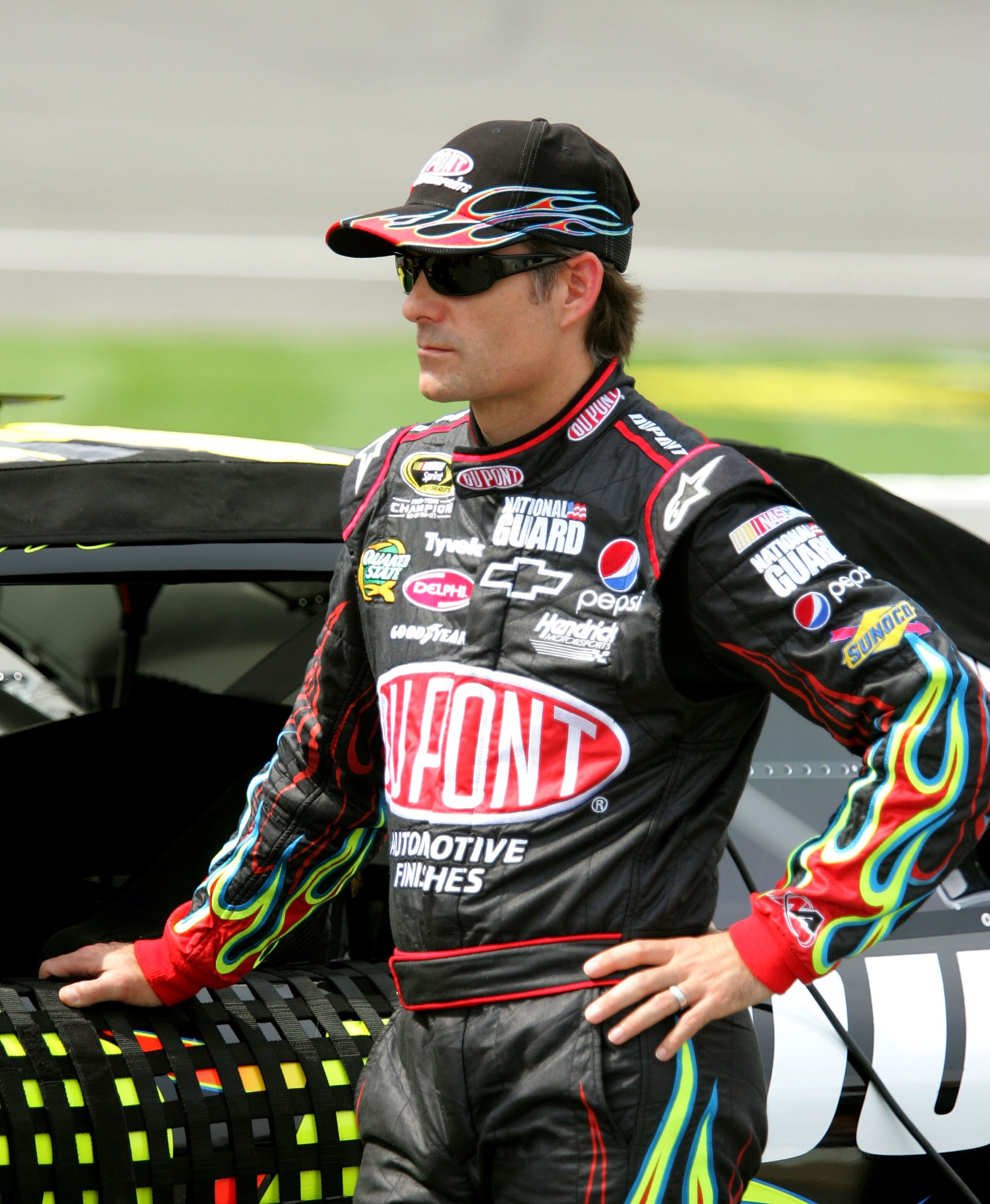 BROOKLYN, MI - AUGUST 13: Jeff Gordon, driver of the #24 DuPont Chevrolet stands on pit road during qualifying for the NASCAR Sprint Cup Series CARFAX 400 at Michigan International Speedway on August 13, 2010 in Brooklyn, Michigan. (Photo by Jerry Markl BROOKLYN, MI - AUGUST 13: Jeff Gordon, driver of the #24 DuPont Chevrolet stands on pit road during qualifying for the NASCAR Sprint Cup Series CARFAX 400 at Michigan International Speedway on August 13, 2010 in Brooklyn, Michigan. (Photo by Jerry Markl