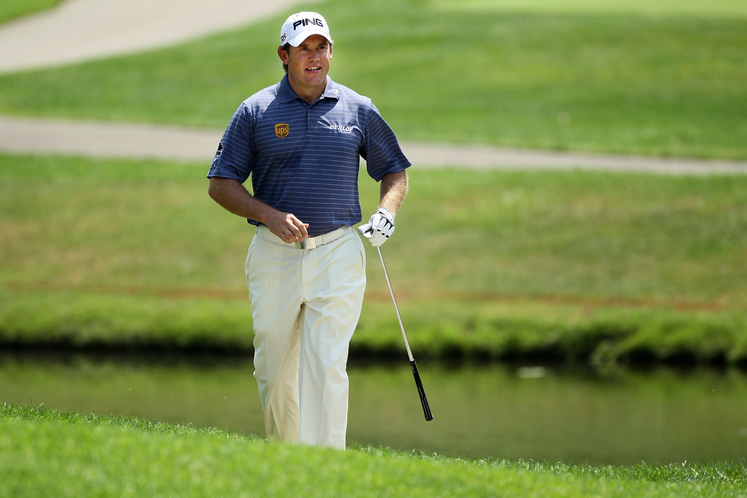 AKRON, OH - AUGUST 05:  Lee Westwood of England reacts to third shot on the third hole during the first round of the World Golf Championships - Bridgestone Invitational on the South Course at Firestone Country Club on August 5, 2010 in Akron, Ohio.  (Phot