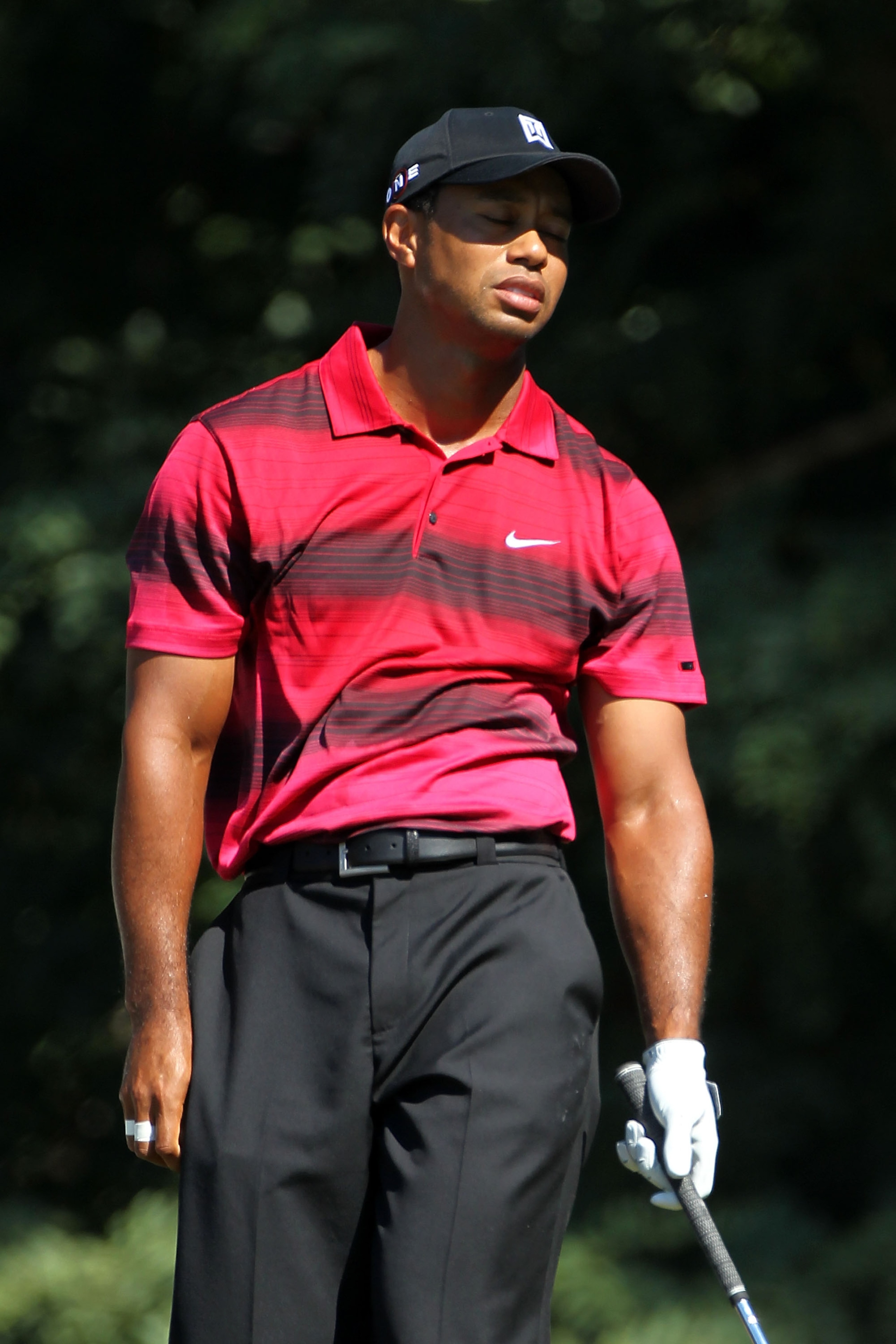 PARAMUS, NJ - AUGUST 29:  Tiger Woods reacts after he tee shot on the second hole during the final round of The Barclays at the Ridgewood Country Club on August 29, 2010 in Paramus, New Jersey.  (Photo by Hunter Martin/Getty Images)