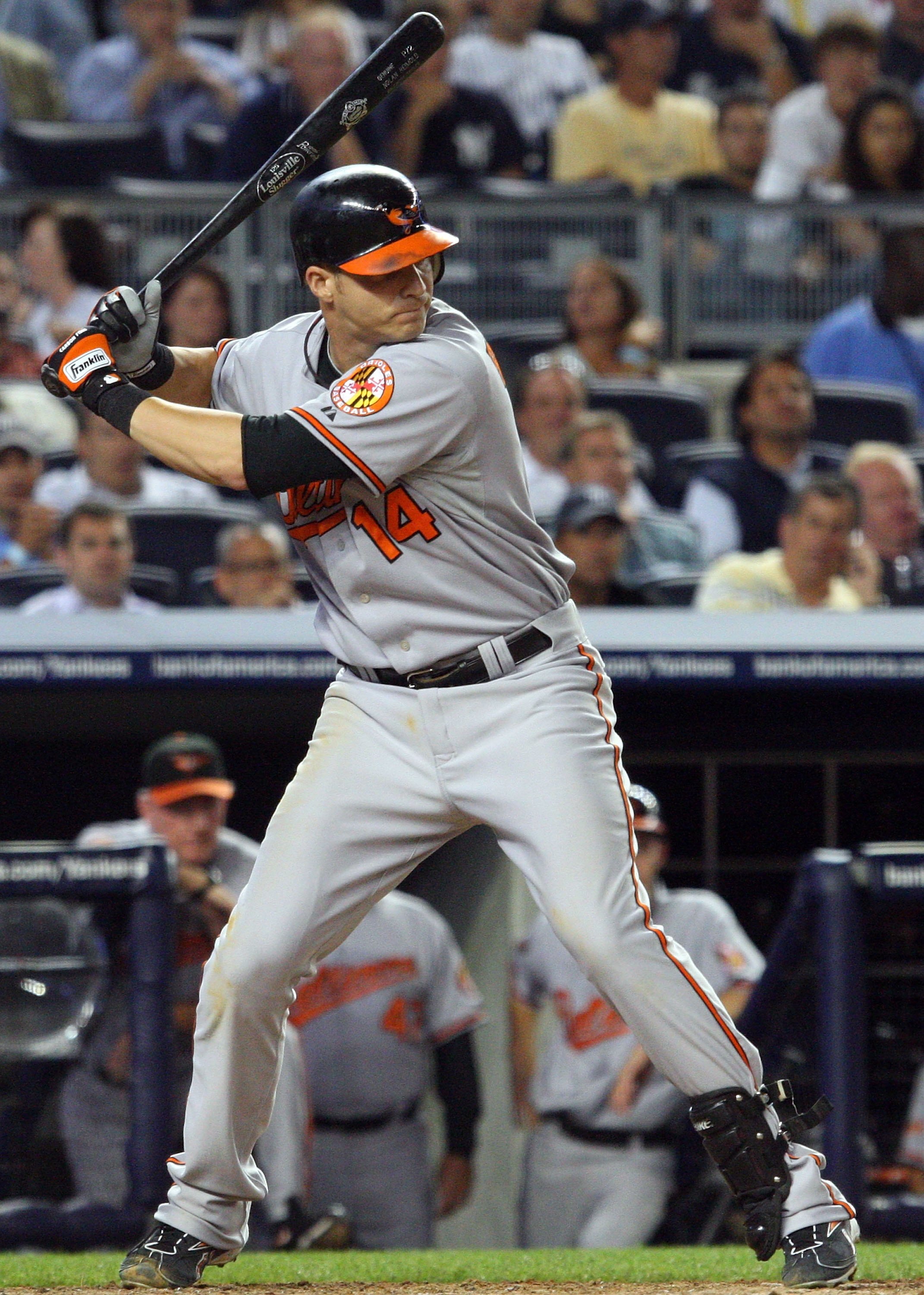 NEW YORK - JULY 20:  Nolan Reimold #14 of the Baltimore Orioles bats against the New York Yankees on July 20, 2009 at Yankee Stadium in the Bronx borough of New York City.  (Photo by Jim McIsaac/Getty Images)