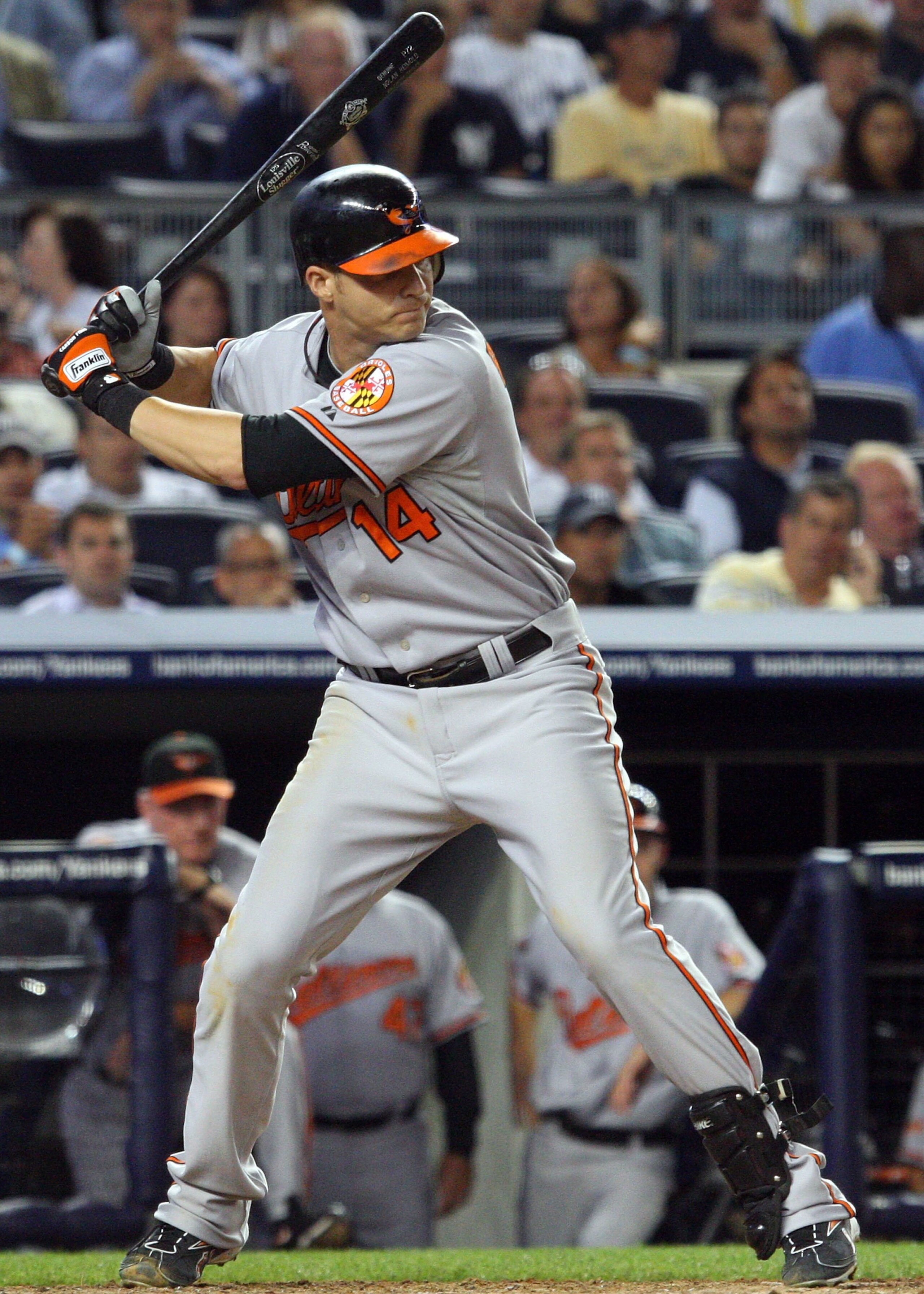 NEW YORK - JULY 20:  Nolan Reimold #14 of the Baltimore Orioles bats against the New York Yankees on July 20, 2009 at Yankee Stadium in the Bronx borough of New York City.  (Photo by Jim McIsaac/Getty Images)