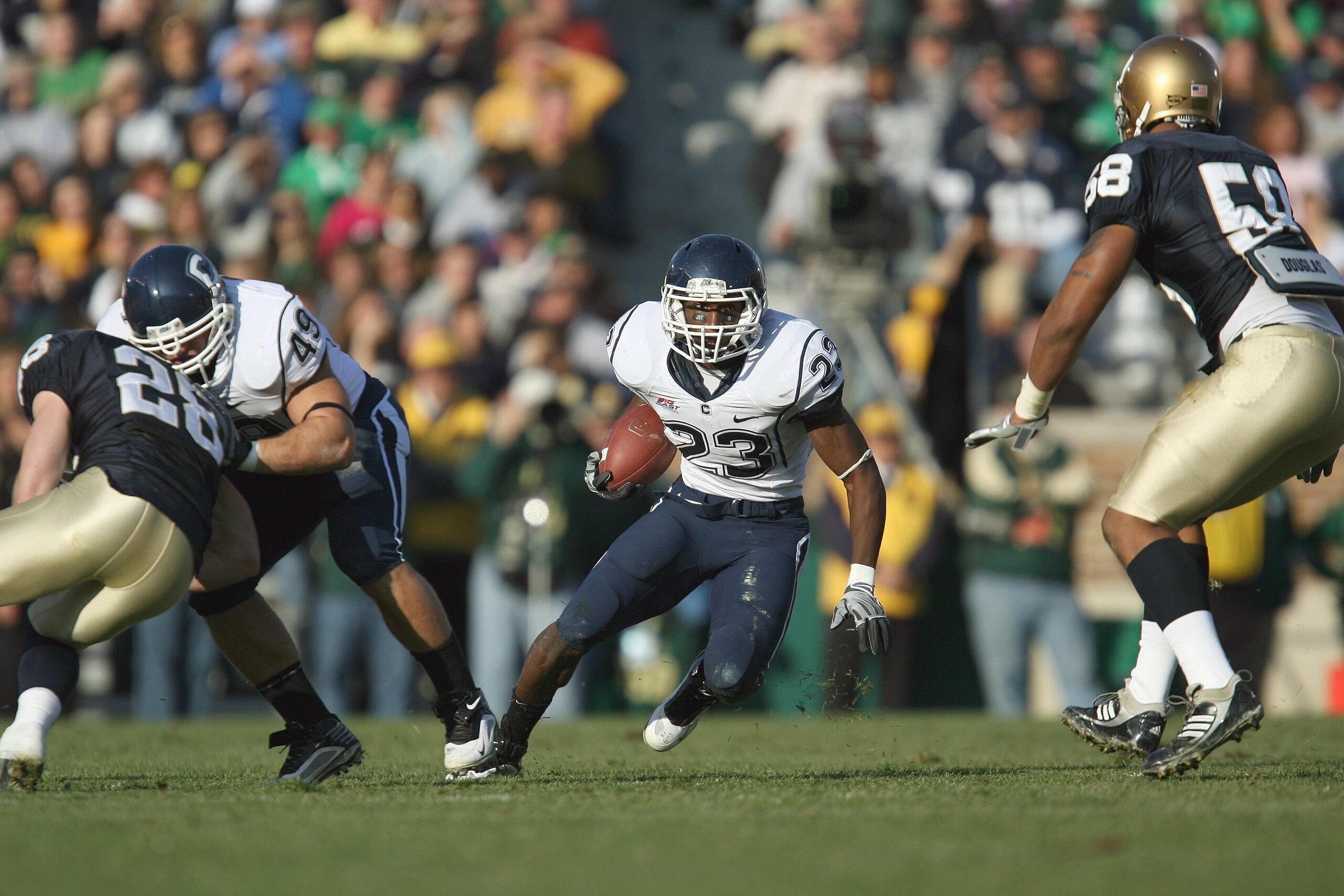 SOUTH BEND, IN - NOVEMBER 21: Jordan Todman #23 of the Univeristy of Connecticut Huskies carries the ball during the game against the Notre Dame Fighting Irish at Notre Dame Stadium on November 21, 2009 in South Bend, Indiana. (Photo by Jonathan Daniel/Ge