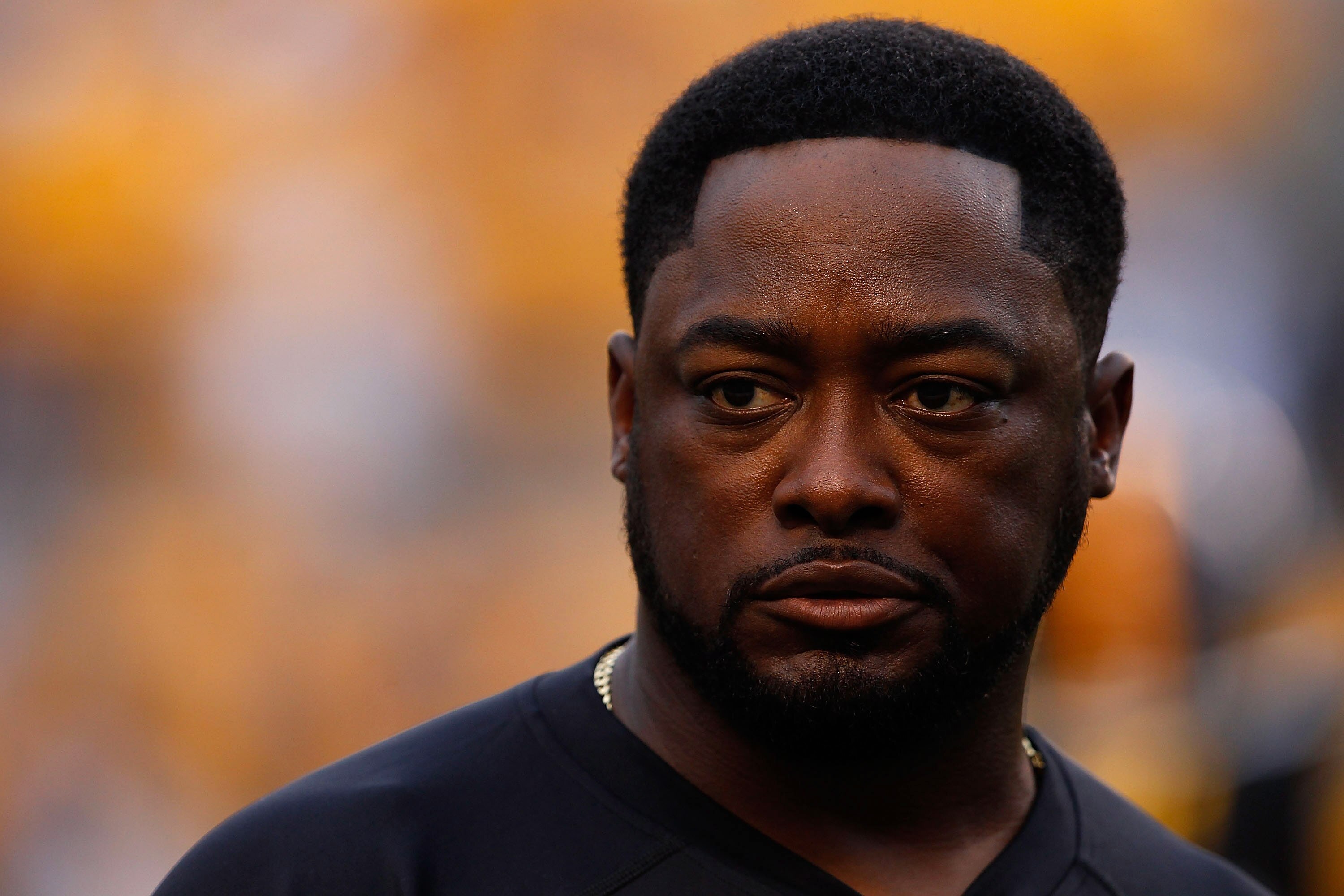 PITTSBURGH - AUGUST 14:  Head coach Mike Tomlin of the Pittsburgh Steelers walks around prior to the game against the Detroit Lions on August 14, 2010 at Heinz Field in Pittsburgh, Pennsylvania.  (Photo by Jared Wickerham/Getty Images)