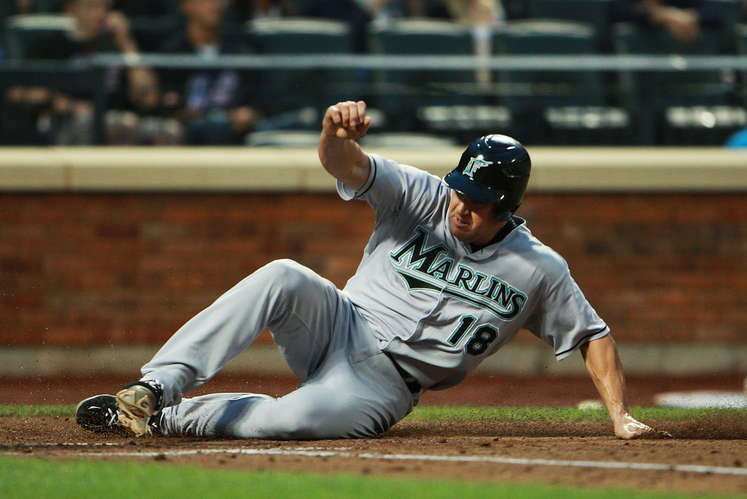 NEW YORK - AUGUST 25:  Wes Helms #18 of the Florida Marlins scores against the New York Mets in the second inning on August 25, 2010 at Citi Field in the Flushing neighborhood of the Queens borough of New York City.  (Photo by Andrew Burton/Getty Images)