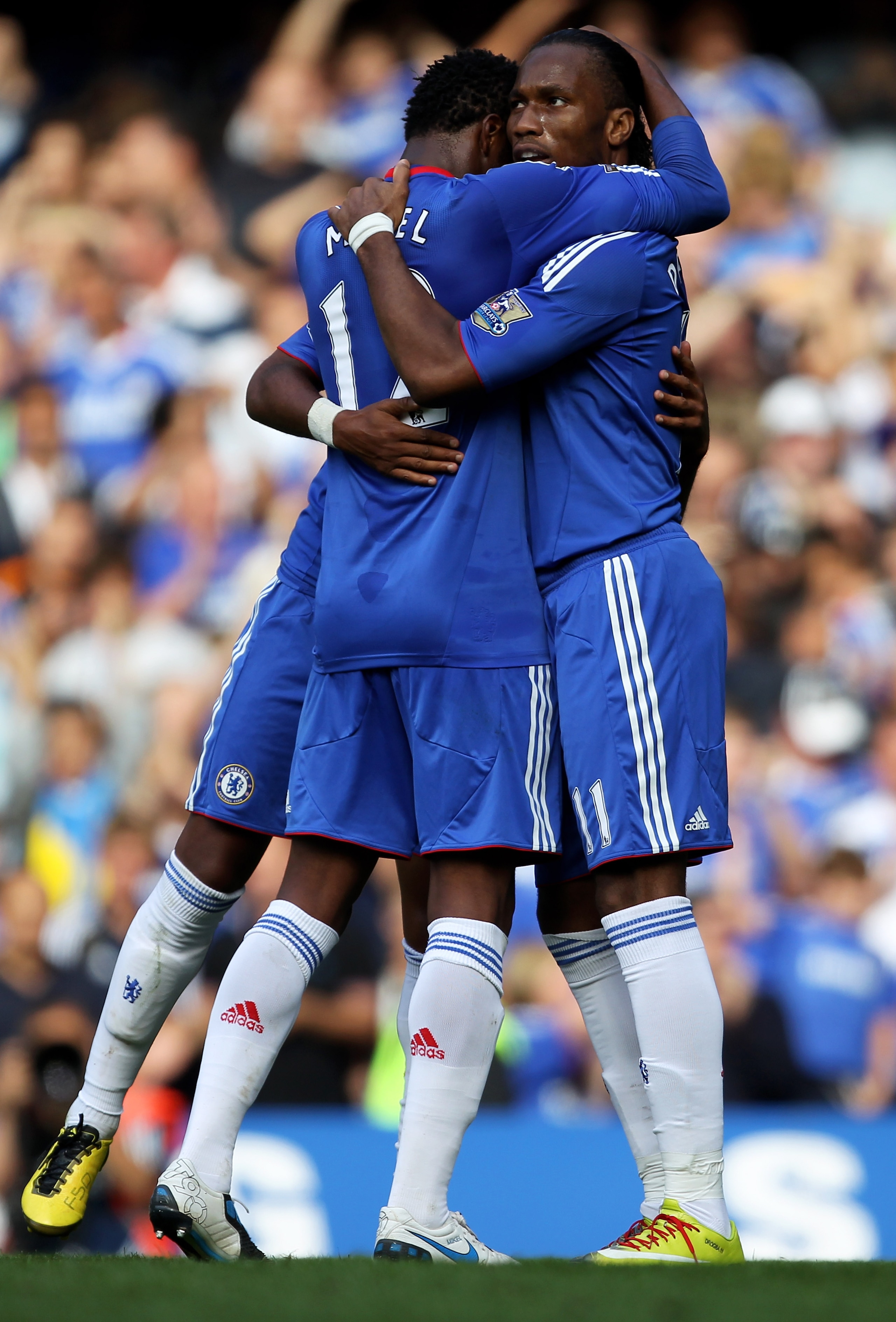 LONDON, ENGLAND - AUGUST 28:  Didier Drogba of Chelsea is congratulated by teammate JOhn Obi Mikel (L) after scoring his team's second goal from the penalty spot during the Barclays Premier League match between Chelsea and Stoke City at Stamford Bridge on